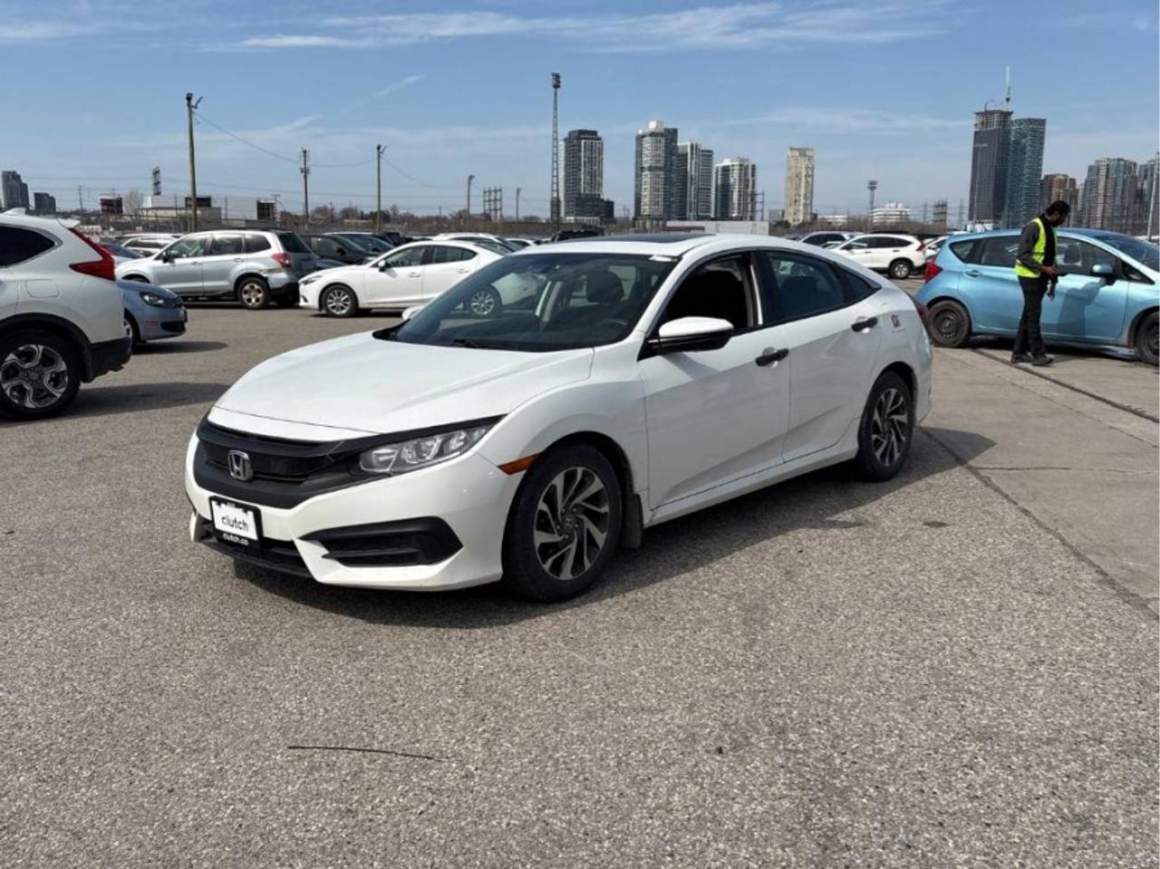 ** ** SPECIAL LIMITED TIME OFFER ** ** PURCHASE ANY VEHICLE THIS WEEK AND RECEIVE 4 BRAND-NEW ALL-SEASON TIRES AT NO ADDITIONAL COST!!! DON   T MISS THIS EXCLUSIVE CHANCE TO UPGRADE YOUR RIDE AND STAY PREPARED FOR ANY WEATHER!!! <br><br>EXCITING NEWS FROM FIRST CHOICE MOTORS! Our brand-new online showroom is now open to the public, bringing the ultimate car shopping experience right to your fingertips! Enjoy a 100% online car shopping experience, with over 500 certified vehicles in stock, comprehensive protection plans, and thousands of new auto parts & accessories available! Plus, for a limited time, were offering FREE deliveries across Ontario on all vehicle purchases! Dont miss out   visit Shop.fcmotors.ca to find and upgrade your perfect vehicle today!<br><br>Welcome to First Choice Motors, the largest car dealership in Toronto of pre-owned cars, SUVs, and vans priced between $5000-$15,000. With an impressive inventory of over 300 vehicles in stock, we are dedicated to providing our customers with a vast selection of affordable and reliable options. <br><br>Were thrilled to offer a used 2016 Honda Civic EX, white color with 174,000km (STK#9657) This vehicle was $14990 NOW ON SALE FOR $12990. It is equipped with the following features:<br>- Automatic Transmission<br>- Sunroof<br>- Heated seats<br>- Bluetooth<br>- Apple CarPlay<br>- Reverse camera<br>- Alloy wheels<br>- Power windows<br>- Power locks<br>- Power mirrors<br>- Air Conditioning<br><br>At First Choice Motors, we believe in providing quality vehicles that our customers can depend on. All our vehicles come with a 36-day guarantee on all safety related items. We also offer additional warranty options up to 5 years for our customers who want extra peace of mind.<br><br>Furthermore, all our vehicles are sold fully certified with brand new brakes rotors and pads, a fresh oil change, and brand new set of all-season tires installed & balanced. You can be confident that this car is in excellent condition and ready to hit the road.<br><br>At First Choice Motors, we believe that everyone deserves a chance to own a reliable and affordable vehicle. Thats why we offer financing options with low interest rates starting at 7.9% O.A.C. Were proud to approve all customers, including those with bad credit, no credit, students, and even 9 socials. Our finance team is dedicated to finding the best financing option for you and making the car buying process as smooth and stress-free as possible.<br><br>Our dealership is open 7 days a week to provide you with the best customer service possible. We carry the largest selection of used vehicles for sale under $9990 in all of Ontario. We stock over 300 cars, mostly Hyundai, Chevrolet, Mazda, Honda, Volkswagen, Toyota, Ford, Dodge, Kia, Mitsubishi, Acura, Lexus, and more. With our ongoing sale, you can find your dream car at a price you can afford. Come visit us today and experience why we are the best choice for your next used car purchase!<br><br>All prices include $22.00 OMVIC Fee.  Excludes, license plates, ownership registration and ONTARIO HST (13%)<br>*No Credit Card payments can be accepted for Vehicle Purchases*