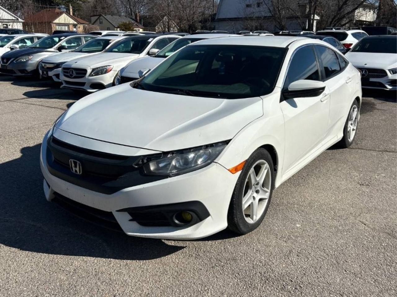 ** ** SPECIAL LIMITED TIME OFFER ** ** PURCHASE ANY VEHICLE THIS WEEK AND RECEIVE 4 BRAND-NEW ALL-SEASON TIRES AT NO ADDITIONAL COST!!! DON   T MISS THIS EXCLUSIVE CHANCE TO UPGRADE YOUR RIDE AND STAY PREPARED FOR ANY WEATHER!!! <br><br>EXCITING NEWS FROM FIRST CHOICE MOTORS! Our brand-new online showroom is now open to the public, bringing the ultimate car shopping experience right to your fingertips! Enjoy a 100% online car shopping experience, with over 500 certified vehicles in stock, comprehensive protection plans, and thousands of new auto parts & accessories available! Plus, for a limited time, were offering FREE deliveries across Ontario on all vehicle purchases! Dont miss out   visit Shop.fcmotors.ca to find and upgrade your perfect vehicle today!<br><br>Welcome to First Choice Motors, the largest car dealership in Toronto of pre-owned cars, SUVs, and vans priced between $5000-$15,000. With an impressive inventory of over 300 vehicles in stock, we are dedicated to providing our customers with a vast selection of affordable and reliable options. <br><br>Were thrilled to offer a used 2017 Honda Civic LX, white color with 254,000km (STK#9687) This vehicle was $10990 NOW ON SALE FOR $9990. It is equipped with the following features:<br>- Manual Transmission<br>- Heated seats<br>- Bluetooth<br>- Apple CarPlay<br>- Reverse camera<br>- Alloy wheels<br>- Power windows<br>- Power locks<br>- Power mirrors<br>- Air Conditioning<br><br>At First Choice Motors, we believe in providing quality vehicles that our customers can depend on. All our vehicles come with a 36-day guarantee on all safety related items. We also offer additional warranty options up to 5 years for our customers who want extra peace of mind.<br><br>Furthermore, all our vehicles are sold fully certified with brand new brakes rotors and pads, a fresh oil change, and brand new set of all-season tires installed & balanced. You can be confident that this car is in excellent condition and ready to hit the road.<br><br>At First Choice Motors, we believe that everyone deserves a chance to own a reliable and affordable vehicle. Thats why we offer financing options with low interest rates starting at 7.9% O.A.C. Were proud to approve all customers, including those with bad credit, no credit, students, and even 9 socials. Our finance team is dedicated to finding the best financing option for you and making the car buying process as smooth and stress-free as possible.<br><br>Our dealership is open 7 days a week to provide you with the best customer service possible. We carry the largest selection of used vehicles for sale under $9990 in all of Ontario. We stock over 300 cars, mostly Hyundai, Chevrolet, Mazda, Honda, Volkswagen, Toyota, Ford, Dodge, Kia, Mitsubishi, Acura, Lexus, and more. With our ongoing sale, you can find your dream car at a price you can afford. Come visit us today and experience why we are the best choice for your next used car purchase!<br><br>All prices include $22.00 OMVIC Fee.  Excludes, license plates, ownership registration and ONTARIO HST (13%)<br>*No Credit Card payments can be accepted for Vehicle Purchases*