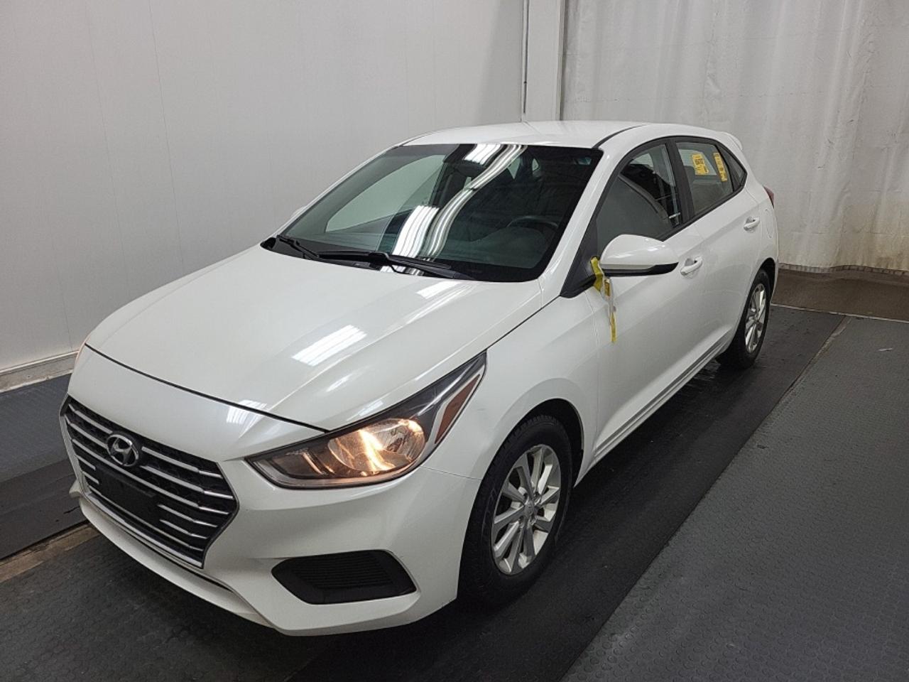 ** ** SPECIAL LIMITED TIME OFFER ** ** PURCHASE ANY VEHICLE THIS WEEK AND RECEIVE 4 BRAND-NEW ALL-SEASON TIRES AT NO ADDITIONAL COST!!! DON   T MISS THIS EXCLUSIVE CHANCE TO UPGRADE YOUR RIDE AND STAY PREPARED FOR ANY WEATHER!!! <br><br>EXCITING NEWS FROM FIRST CHOICE MOTORS! Our brand-new online showroom is now open to the public, bringing the ultimate car shopping experience right to your fingertips! Enjoy a 100% online car shopping experience, with over 500 certified vehicles in stock, comprehensive protection plans, and thousands of new auto parts & accessories available! Plus, for a limited time, were offering FREE deliveries across Ontario on all vehicle purchases! Dont miss out   visit Shop.fcmotors.ca to find and upgrade your perfect vehicle today!<br><br>Welcome to First Choice Motors, the largest car dealership in Toronto of pre-owned cars, SUVs, and vans priced between $5000-$15,000. With an impressive inventory of over 300 vehicles in stock, we are dedicated to providing our customers with a vast selection of affordable and reliable options. <br><br>Were thrilled to offer a used 2019 Hyundai Accent PREFERRED, white color with 158,000km (STK#9703) This vehicle was $10990 NOW ON SALE FOR $9990. It is equipped with the following features:<br>- Automatic Transmission<br>- Hatchback<br>- Heated seats<br>- Bluetooth<br>- Apple CarPlay<br>- Reverse camera<br>- Alloy wheels<br>- Power windows<br>- Power locks<br>- Power mirrors<br>- Air Conditioning<br><br>At First Choice Motors, we believe in providing quality vehicles that our customers can depend on. All our vehicles come with a 36-day guarantee on all safety related items. We also offer additional warranty options up to 5 years for our customers who want extra peace of mind.<br><br>Furthermore, all our vehicles are sold fully certified with brand new brakes rotors and pads, a fresh oil change, and brand new set of all-season tires installed & balanced. You can be confident that this car is in excellent condition and ready to hit the road.<br><br>At First Choice Motors, we believe that everyone deserves a chance to own a reliable and affordable vehicle. Thats why we offer financing options with low interest rates starting at 7.9% O.A.C. Were proud to approve all customers, including those with bad credit, no credit, students, and even 9 socials. Our finance team is dedicated to finding the best financing option for you and making the car buying process as smooth and stress-free as possible.<br><br>Our dealership is open 7 days a week to provide you with the best customer service possible. We carry the largest selection of used vehicles for sale under $9990 in all of Ontario. We stock over 300 cars, mostly Hyundai, Chevrolet, Mazda, Honda, Volkswagen, Toyota, Ford, Dodge, Kia, Mitsubishi, Acura, Lexus, and more. With our ongoing sale, you can find your dream car at a price you can afford. Come visit us today and experience why we are the best choice for your next used car purchase!<br><br>All prices include $22.00 OMVIC Fee.  Excludes, license plates, ownership registration and ONTARIO HST (13%)<br>*No Credit Card payments can be accepted for Vehicle Purchases*