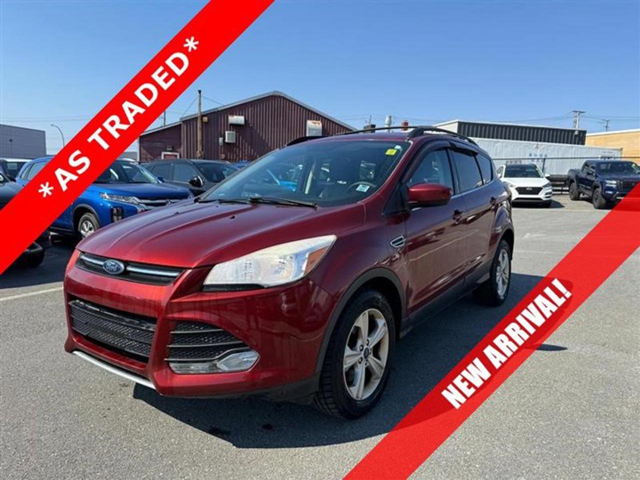 Recent Arrival! 2015 Ford Escape SE HEATED SEATS AWD.Ruby Red Metallic Tinted Clearcoat 2015 Ford Escape SE HEATED SEATS AWD 6-Speed Automatic with Select-Shift EcoBoost 1.6L I4 GTDi DOHC Turbocharged VCTSteele Mitsubishi has the largest and most diverse selection of preowned vehicles in HRM. Buy with confidence, knowing we use fair market pricing guaranteeing the absolute best value in all of our pre owned inventory!Steele Auto Group is one of the most diversified group of automobile dealerships in Canada, with 60 dealerships selling 29 brands and an employee base of well over 2300. Sales are up over last year and our plan going forward is to expand further into Atlantic Canada and the United States furthering our commitment to our Canadian customers as well as welcoming our new customers in the USA.Reviews:* Owners appreciate a modern and unique cabin layout, peace of mind in bad weather, and pleasing performance from the turbocharged engines, particularly the larger 2.0L unit. Controls are said to be easy to use, and interfaces are easily learned. Plenty of at-hand storage is fitted within reach of all occupants to help keep organized and tidy on the move, and the tall and upright driving position helps add confidence. Good brake feel is also noted, particularly during hard stops. Source: autoTRADER.caAwards:* JD Power Canada Initial Quality Study (IQS)