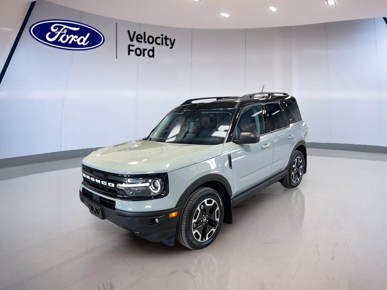 // SINGLE OWNER! //

Meet the 2024 Ford Bronco Sport Outer Banks 4x4 COMING SOON, now at Velocity Ford in Moose Jaw. CARFAX Canada reports a single owner, and this used SUV shows 30,883 km. Grey paint, a Black interior, four doors, and a fuel-saving 1.5-litre unleaded engine give it broad appeal.

This 2024 Ford Bronco Sport Outer Banks 4x4 COMING SOON pairs everyday comfort with sure-footed 4WD confidence. Its automatic transmission helps deliver smooth city driving and relaxed highway travel. Inside, you get practical features that make daily use easy, from heated front seats to dual-zone climate control.

FEATURES OF THE Bronco Sport Outer Banks 4x4 COMING SOON
»» Grey exterior with Black interior
»» 1.5-litre unleaded engine with 4WD
»» Automatic transmission for smooth daily driving
»» Four-door SUV with versatile cabin

ADVANCED SAFETY FEATURES
»» Backup camera helps with reverse visibility
»» Lane departure warning adds extra awareness
»» Blind spot monitor supports safer lane changes
»» Side and head airbags boost protection

PERFORMANCE AND EFFICIENCY
»» 1.5-litre engine balances power and economy
»» Eight-speed automatic supports smooth shifting
»» Four-wheel drive adds year-round confidence
»» Power steering aids easy urban handling

COMFORT AND CONVENIENCE
»» Heated front seats add cold-weather comfort
»» Dual-zone climate control helps cabin comfort
»» Memory seat settings save driver preferences
»» Push button start adds daily convenience

TECHNONOLGY AND CONNECTIVITY
»» Bluetooth integration supports hands-free calling
»» Satellite radio expands listening choices
»» Steering wheel audio controls ease use
»» Automatic headlights help in changing light

CARGO SPACE
»» Rear trunk access makes loading easier
»» Four-door layout helps passenger entry
»» Spare tire adds travel peace
»» Power windows support quick ventilation

AWARDS & RECOGNITIONS
»» Top Safety Pick, Insurance Institute for Highway Safety, 2024

WHAT OTHER OWNERS LIKE
»» Easy-to-drive size for daily use
»» Confident all-weather traction from 4WD
»» Comfortable heated seats for winter
»» Useful cargo room and flexible cabin

This Ford SUV also includes many everyday essentials drivers want most. You get cruise control, anti-lock braking system, stability control, child safety locks, heated mirrors, electric mirrors, tinted windows, fog lights, tire pressure monitoring, rear window defroster, and LED headlamps.

Cabin convenience is strong in this Bronco Sport. It features front air conditioning, automatic climate control, an adjustable steering wheel, driver lumbar support, illuminated driver and passenger vanity mirrors, an auto-dimming rearview mirror, automatic door locks, and memory mirrors for added ease.

Passenger comfort and support are well covered too. A power driver seat and electric passenger seat help you find the right position quickly. The roomy SUV design also gives you the flexibility needed for shopping, commuting, and weekend travel around Saskatchewan.

This 2024 Ford Bronco Sport Outer Banks 4x4 COMING SOONs VIN is: 3FMCR9C6XRRE50626.