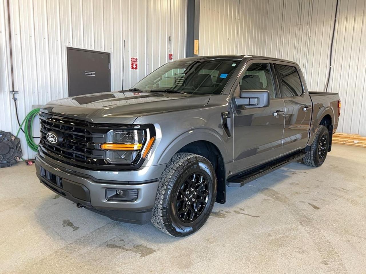 Built for hard work and everyday ease, this brand new 2026 Ford F-150 XLT 4WD 5.5 Box is ready for life in Moose Jaw. Its Grey exterior and Black interior give it a clean, modern look. With four doors, automatic transmission, and a 2.7-litre unleaded engine, it delivers strong capability with the confidence Canadian truck buyers expect.

This full-size pickup blends practical comfort, useful safety features, and proven Ford truck strength. The 2026 Ford F-150 XLT 4WD 5.5 Box is well suited for commuting, jobsite duty, weekend towing, and year-round driving. Four-wheel drive, off-road tires, and a 4,671 kg towing capacity help this truck handle changing road and weather conditions with ease.

FEATURES OF THE F-150 XLT 4WD 5.5 Box

»» 2.7-litre unleaded engine with automatic transmission
»» Four-wheel drive for added year-round traction
»» Four-door cabin with practical daily usability
»» 5.5-foot box for versatile cargo needs

TRUCK FEATURES

»» Tows up to 4,671 kg confidently
»» Rear tow hook supports truck utility
»» Off-road tires add extra surface grip
»» Short box helps urban manoeuvrability

ADVANCED SAFETY FEATURES

»» Backup camera helps with reversing visibility
»» Blind spot monitor adds lane awareness
»» Lane departure warning supports safer travel
»» Stability control helps maintain vehicle balance

PERFORMANCE AND EFFICIENCY

»» 2.7-litre engine delivers solid everyday power
»» Automatic transmission supports smooth shifting performance
»» Four-wheel drive boosts traction on rough roads
»» Anti-lock brakes aid controlled stopping response

COMFORT AND CONVENIENCE

»» Front air conditioning keeps cabin comfortable
»» Power windows add everyday convenience
»» Heated mirrors help in cold weather
»» Driver lumbar support improves long-drive comfort

TECHNONOLGY AND CONNECTIVITY

»» Bluetooth integration supports hands-free phone use
»» WiFi hotspot keeps passengers better connected
»» Satellite radio expands in-cabin entertainment choices
»» Steering wheel audio controls simplify access

CARGO SPACE

»» 5.5-foot box suits daily hauling tasks
»» Rear trunk access improves loading convenience
»» Spare tire adds peace of mind
»» Four-door layout supports gear and passengers

WHAT OTHER OWNERS LIKE

»» Strong towing ability for work and play
»» Comfortable ride for daily truck use
»» User-friendly tech for simple connectivity
»» Confident four-wheel drive in changing seasons

This 2026 Ford F-150 XLT 4WD 5.5 Boxs VIN is: 1FTEW3LPXTKD55281.