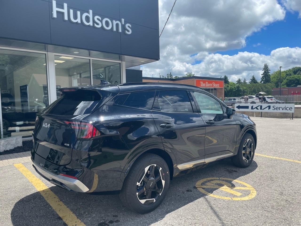 2026 Kia Sportage Hybrid EX Premium AWD Photo4