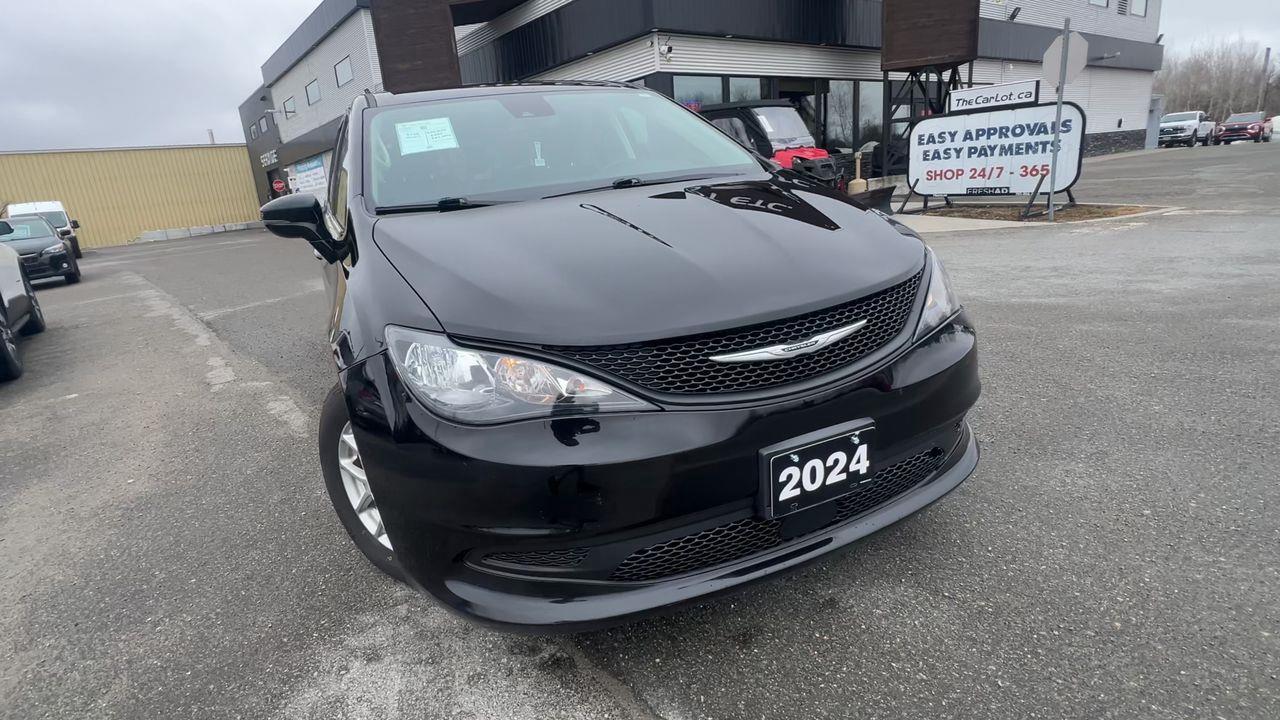 2024 Dodge Grand Caravan SXT 7 PASSENGER, DUAL POWER SLIDING DOORS, HEATED FRONT SEATS, NAV, CRUISE CONTROL, POWER LIFTGATE, BACK Photo