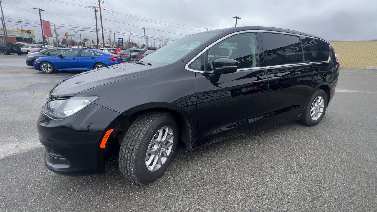 2024 Dodge Grand Caravan SXT 7 PASSENGER, DUAL POWER SLIDING DOORS, HEATED FRONT SEATS, NAV, CRUISE CONTROL, POWER LIFTGATE, BACK Photo