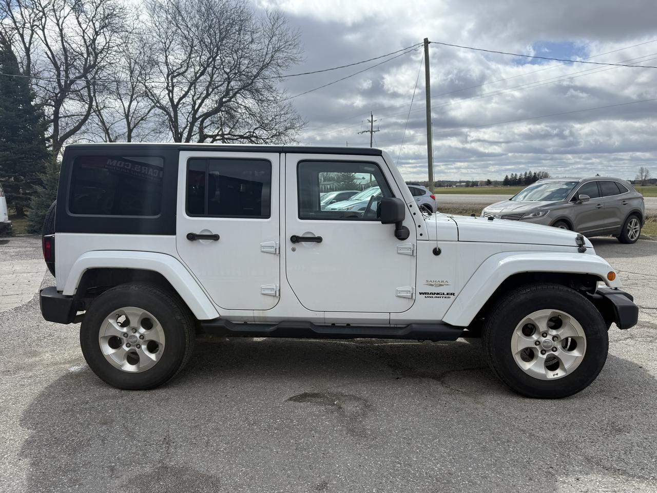 2013 Jeep Wrangler Sahara | 4x4 | Leather | Bluetooth Photo