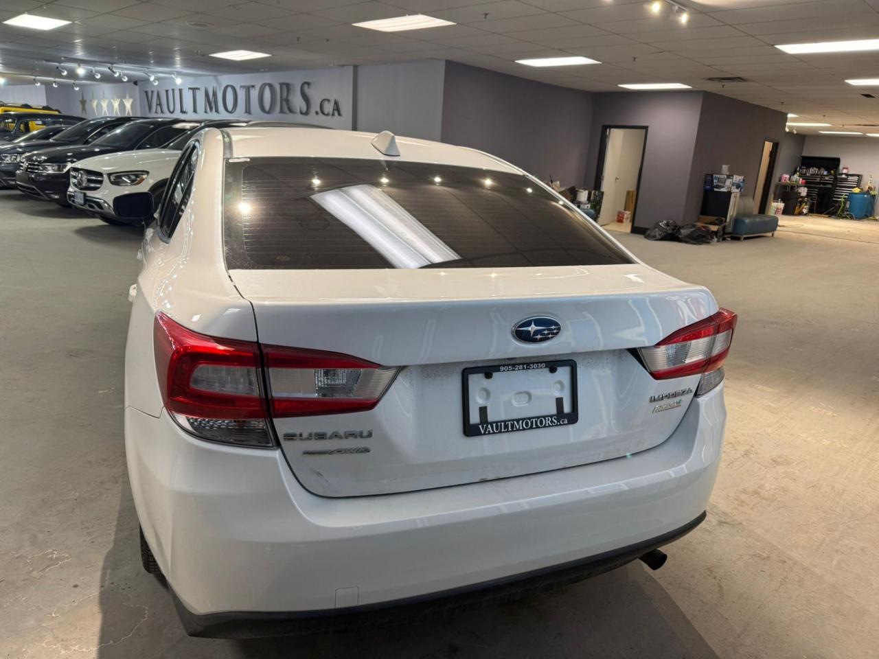 2017 Subaru Impreza 4dr Sdn Man Touring, 21 Service records, No Accident Photo