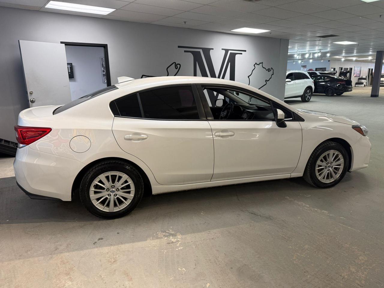2017 Subaru Impreza 4dr Sdn Man Touring, 21 Service records, No Accident Photo