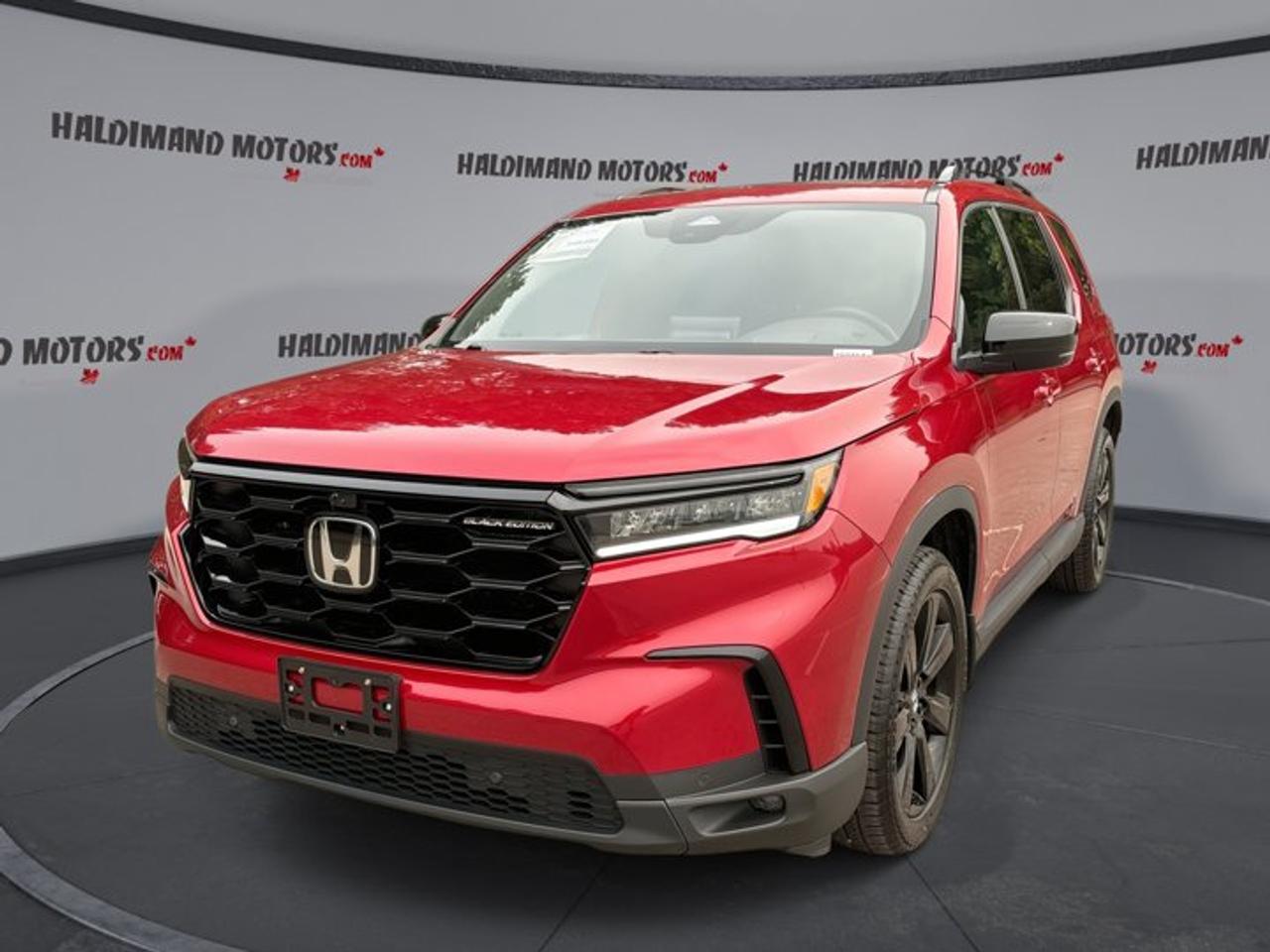 // ACCIDENT FREE!! //<br />// SINGLE OWNER! //<br /><br />This 2024 Honda Pilot Black Edition AWD is a full-size SUV that brings power, comfort, and smart family-ready design together in one premium package. Sold by Haldimand Motors Ltd. in Cayuga, this red, accident-free, single-owner Honda Pilot Black Edition AWD stands out with confident style, a smooth automatic transmission, and a capable 3.5-litre gas engine.<br /><br />With 101,637 km on the odometer, this used SUV shows the kind of versatility drivers want for daily travel, weekend trips, and busy family life. The black interior adds a refined feel, while four doors, all-wheel drive confidence, and a long list of sought-after features make this Honda Pilot Black Edition AWD a strong choice for drivers who need space and comfort.<br /><br />FEATURES OF THE Pilot Black Edition AWD | One Owner | No Accidents | 360 Camera | Ventilated Seats | Panoramic Roof<br />   Panoramic roof brings in open-air light<br />   Ventilated front seats add summer comfort<br />   360-degree camera aids close manoeuvres<br />   Black Edition styling adds premium presence<br /><br />ADVANCED SAFETY FEATURES<br />   Blind spot monitor helps with lane changes<br />   Lane departure warning adds driving confidence<br />   Anti-lock braking system supports controlled stops<br />   Side and head airbags enhance protection<br /><br />PERFORMANCE AND EFFICIENCY<br />   3.5-litre gas engine delivers smooth power<br />   Automatic transmission supports easy daily driving<br />   All-wheel drive adds year-round traction<br />   Stability control helps maintain road composure<br /><br />COMFORT AND CONVENIENCE<br />   Ventilated front seats improve warm-weather comfort<br />   Heated front and rear seats included<br />   Heated steering wheel feels great in winter<br />   Remote starter adds everyday convenience<br /><br />TECHNONOLGY AND CONNECTIVITY<br />   Apple CarPlay keeps apps within reach<br />   Android Auto supports simple phone integration<br />   Navigation system helps guide each trip<br />   Bluetooth integration supports hands-free communication<br /><br />CARGO SPACE<br />   Rear trunk access makes loading easier<br />   Power liftgate adds simple cargo access<br />   Spacious cabin suits family travel needs<br />   Flexible storage supports daily hauling tasks<br /><br />AWARDS & RECOGNITIONS<br />   Top Safety Pick, Insurance Institute for Highway Safety, 2024<br /><br />WHAT OTHER OWNERS LIKE<br />   Smooth ride quality on long trips<br />   Spacious interior for passengers and gear<br />   Strong V6 power for confident driving<br />   User-friendly technology for everyday convenience<br /><br />The cabin is built to keep everyone comfortable. Heated front and rear seats help in cold Canadian weather, while dual-zone automatic climate control and rear air conditioning help keep passengers happy in every row. Memory seats, memory mirrors, a power drivers seat, and a power passenger seat add ease to every drive.<br /><br />This SUV also delivers impressive convenience in daily use. Push-button start, a power liftgate, power windows, heated mirrors, retractable mirrors, and an auto-dimming rearview mirror all help make each trip simpler. Tinted windows, ambient lighting, fog lights, and LED headlamps add style and function without overcomplicating the experience.<br /><br />On the tech side, this Honda is well equipped for modern driving. Apple CarPlay, Android Auto, satellite radio, HD Radio, Wi-Fi hotspot capability, steering wheel audio controls, and a head-up display all help keep information and entertainment close at hand. The 360-degree camera and backup camera are especially useful when parking in tighter spaces.<br /><br />Drivers also appreciate the balanced road manners of the Pilot. The 3.5-litre engine is known for strong, smooth performance, and the automatic transmission helps deliver easy acceleration in city traffic and on the highway. Power steering, cruise control, adaptive cruise control, and a dual shift mode transmission all add to the confident feel behind the wheel.<br /><br />Finished in red with a black interior, this four-door SUV has the bold look, practical space, and premium features many buyers want in a modern family vehicle. If you are shopping for a well-equipped, accident-free, single-owner SUV in Cayuga, this 2024 Honda Pilot Black Edition AWD deserves a close look.<br /><br />This 2024 Honda Pilot Black Edition AWD | One Owner | No Accidents | 360 Camera | Ventilated Seats | Panoramic Roofs VIN is: 5FNYG1H80RB500110.<br /><br />WHY CHOOSE US? <br /><br />Honest & Transparent Buying Experience: Weve been a trusted name in business since 1984.<br /><br />STRAIGHTFORWARD PRICING:<br />Our Advertised Price Includes:<br />>>Safety Certification (No separate fee!)<br />>>30-Day 100% Mechanical Warranty<br />>>FREE Carfax History Report.<br />>>No upcharge for paying cash.<br />(Prices Exclude HST and Licensing Fees only.)<br /><br />>>Browse 300+ vehicles all in ONE LOCATION<br /><br />EASY FINANCING: Great rates & open loans<br /><br />WE BUY CARS: Get Top Dollar for your trade-in, or sell us your vehicle for CASH! Even if you dont buy from us!<br /><br />STOP BY TODAY<br />Treat yourself - stop by Haldimand Motors Ltd. located at 42 Talbot St E, Cayuga, ON N0A 1E0 to make this car yours today!<br /><br />https://www.haldimandmotors.com/used/stock-460414.html