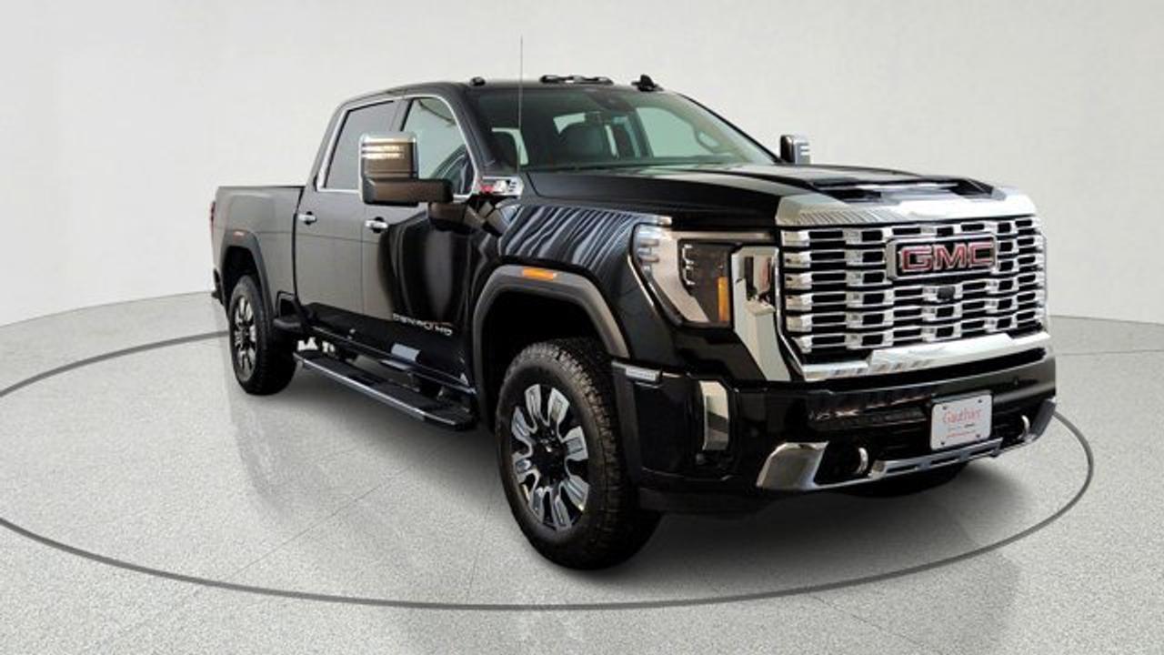 The 2026 GMC Sierra 2500HD Denali is a heavy-duty pickup that combines serious towing and hauling capability with upscale comfort and technology. Its equipped with a powerful Duramax 6.6-liter turbo-diesel V8 engine producing up to 470 hp and 975 lb-ft of torque, paired with a 10-speed automatic transmission. It offers advanced trailer-assist technologies and a six-function MultiPro tailgate. Inside, the Denali trim features premium materials, a large 13.4-inch touchscreen with Google built-in, a digital driver display, luxurious leather-trimmed seating with available massage functions, and a suite of advanced safety and connectivity features.This model comes ready to work with a gooseneck / 5th wheel package and a Universal Vehicle Module. Theres also a power sunroof to take it all in.