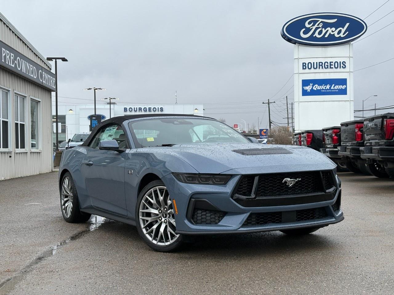<p>The 2026 Ford Mustang GT Premium in a striking blue finish and RWD offers exhilarating handling for those who crave the open road. It's more than just a convertible, its a statement of power and style with its bold design and the iconic Mustang presence.</p> <p>The exterior showcases a dynamic profile with alloy wheels, while heated mirrors with pony puddle lamps add an extra touch of sophistication. Step inside to a luxurious black interior featuring leatherette door trim, stitched accents, and a 5-piece leather-wrapped steering wheel that emphasizes comfort and style.</p> <p>Technological advancements meet safety in this Mustang GT Premium. Its equipped with a magnesium-framed panoramic curved display and an array of features including the Ford Co-Pilot360 Assist+ with adaptive cruise control and lane centering assist, ensuring a safe, confident drive. Apple users will appreciate the smart device integration and wi-fi hotspot for seamless connectivity. Additionally, advanced safety features like pre-collision assist with automatic emergency braking and a blind spot monitor help keep you and your passengers safe.</p> <p>Perfect for thrill-seekers and those who love the feel of wind in their hair, the 2026 Mustang GT Premium Convertible awaits at our dealership. Embrace the power of the 5.0L V8 engine and the freedom of the open road. Contact us now for more information or to schedule a test drive and experience the future of driving today!</p> <p><span style=color:rgb( 58 , 80 , 95 )>The discount shown on vehicle represents the </span><u>Cash Purchase</u><span style=color:rgb( 58 , 80 , 95 )> discount and is inclusive of all non-stackable and stackable cash purchase discounts from Ford of Canada and Bourgeois Motors Ltd. and is offered in lieu of sub-vented lease or finance rates. To get details on current discounts applicable to this and other vehicles in our inventory for Lease and Finance customer, see a member of our team. All offers for lease or finance are On Approved Credit (OAC).While every effort is made to ensure the accuracy of discounts and programs, programs are subject to change without notice </span><span style=color:rgb( 119 , 119 , 119 )>and may not be accurate or completely current. While every reasonable effort is made to ensure the accuracy of this data, we are not responsible for any errors or omissions contained on these pages.</span></p> <p><strong>Why Choose the Bourgeois Auto Group?</strong></p><p>For 80 years, Bourgeois Auto Group has been delivering exceptional automotive experiences. Our factor trained teams work to ensure you receive the shopping experience you deserve; whether you're looking for a new or new-to-you vehicle.</p><p>Shop 24/7 with our online showroom and chat service, ensuring convenience every step of the way. No hidden fees, full disclosure, and every pre-owned vehicle comes with a Carfax® report for peace of mind.</p><p>We offer a wide selection of pre-owned vehicles, all competitively priced using real-time market data. Get the best deal on your purchase and trade-in with our free Live Market Analysis report.</p><p>Looking to sell your car? We buy any make or modelno purchase required. Our simple to use online trade valuation tool will provide you with a clear, transparent selling experience whether you buy our car or not.</p><p>Backed by hundreds dedicated employees across 4 convenient locations, were here to meet all your automotive needs. Visit us in Midland or Parry Sound and explore our inventory or schedule your next service today.</p> <p><strong>Financing Your Next Vehicle with Bourgeois Motors Ford in Midland:</strong></p><p>At Bourgeois Motors Ford, we make financing your next vehicle simple and stress-free! Our team works with trusted lenders to find flexible options tailored to your budget. Drive away with confidenceapply today!</p><p>Take advantage of our online pre-qualification tool, backed by Equifax and TD Bank to find the payment that works for you. Simply <a href=https://www.bourgeoismotors.com/free-credit-check/ rel=nofollow><strong>CLICK HERE</strong></a><strong> </strong>to use our secure online credit tool with no impact to your credit.</p>