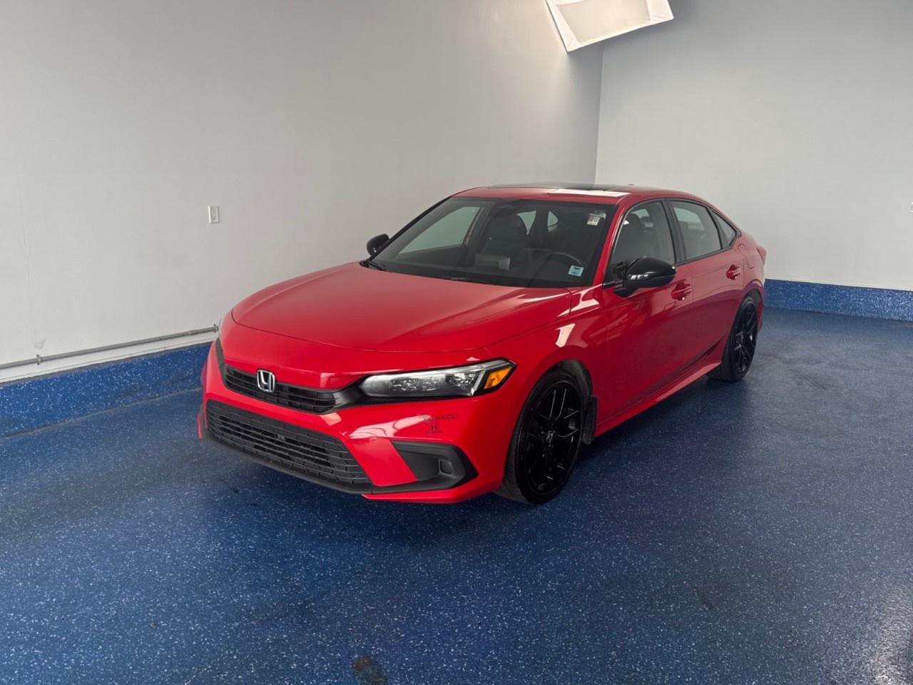 New Price! 2024 Honda Civic Sport Sedan Sport | One Owner | Zacks Certified. CVT FWD Rallye Red 2.0L 4-Cylinder DOHC 16V i-VTEC<br /><br /><br />Black w/Cloth Seating Surfaces, Air Conditioning, Alloy wheels, Apple CarPlay/Android Auto, Automatic temperature control, Electronic Stability Control, Exterior Parking Camera Rear, Forward collision: Collision Mitigation Braking System (CMBS) + FCW mitigation, Front Bucket Seats, Fully automatic headlights, Heated Front Bucket Seats, Heated steering wheel, Leather Shift Knob, Leather steering wheel, Power moonroof, Power windows, Radio: AM/FM Audio System w/8 Speakers, Remote keyless entry, Tilt steering wheel, Turn signal indicator mirrors, Wheels: 18''' Black Aluminum-Alloy.<br /><br />Certification Program Details: Fresh 2 Yr MVI | 30 day warranty* | 110 point inspection | Full tank of fuel | Krown rustproofed | Flexible financing options | Professionally detailed<br /><br />This vehicle is Zacks Certified! You're approved! We work with you. Together we'll find a solution that makes sense for your individual situation. Please visit us or call 902 843-3900 to learn about our great selection.<br /><br />With 22 lenders available Zack's Auto Sales can offer our customers with the lowest available interest rate. Thank you for taking the time to check out our selection!