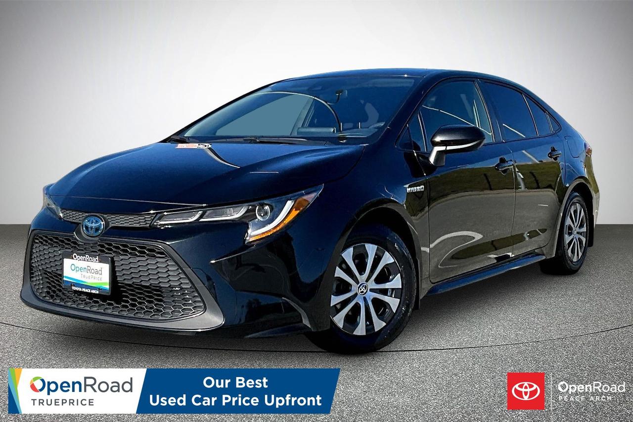 The 2021 Toyota Corolla Hybrid offers excellent efficiency, comfort, and safety in a compact sedan. It features a 1.8-litre 4-cylinder hybrid powertrain producing 121 horsepower with a smooth CVT and front-wheel drive. Fuel economy is outstanding at about 4.5 L/100 km combined. Inside, it includes premium cloth seating, automatic climate control, keyless ignition, and a user-friendly infotainment system with Apple CarPlay and Android Auto. Standard safety comes from Toyota Safety Sense, including adaptive cruise control, lane departure warning, and pre-collision braking. Additional highlights include a rearview camera, LED headlights, alloy wheels, and a comfortable, quiet ride.  Have confidence with your OpenRoad purchase! Every OpenRoad Certified Pre-Owned vehicle comes fully reconditioned and complete with a comprehensive 153 point mechanical inspection, a CarFax history & lien report, a 3-Day Money Back Guarantee, a 30-Day/2,000 kms Exchange Policy, a 90-Day/5,000 kms Powertrain Warranty, guaranteed clear title, and membership to our exclusive Club OpenRoad! As a proud member of the OpenRoad Auto Group, a trusted name since 2000 serving the Lower mainland (including White Rock, Surrey, Langley, Maple Ridge, Delta, Richmond, Mission and beyond) with outstanding Toyota vehicles, Toyota parts, and Toyota service since 1966! OpenRoad Toyota Peace Arch is a &ldquo;True Price&rdquo; dealer, meaning no inflated prices, and no need for back and forth haggling! We use up to the minute technology offering LIVE MARKET VALUE PRICING to ensure you are receiving the most competitive price possible on all of our Pre-Owned vehicles!  All advertised vehicle prices do not include our $699 documentation fee.