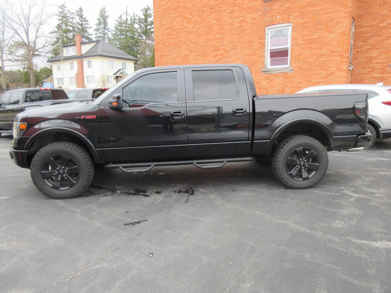2014 Ford F-150 4WD SUPERCREW 145" LARIAT Photo