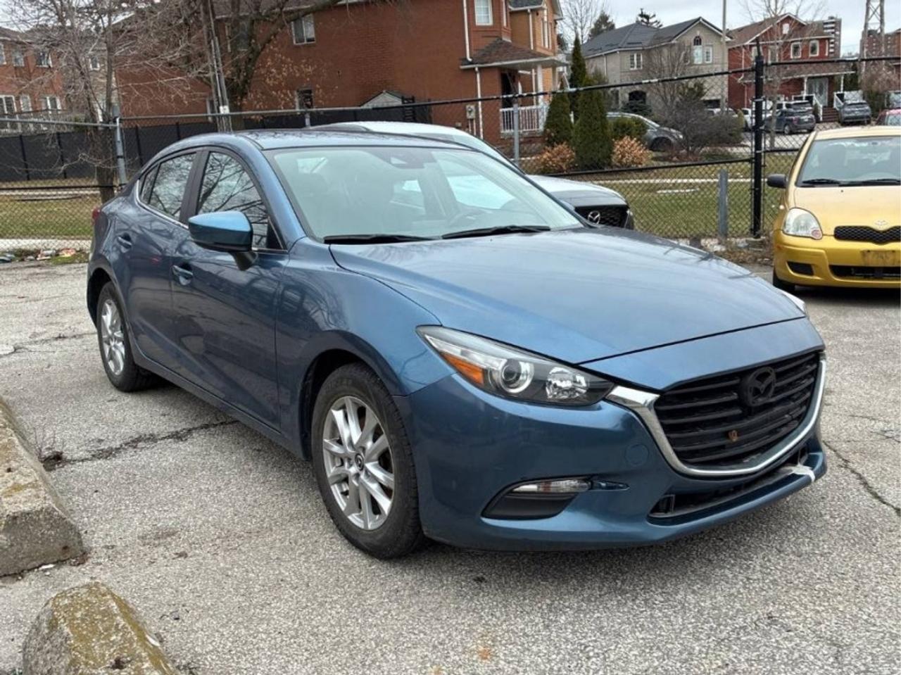 ** ** SPECIAL LIMITED TIME OFFER ** ** PURCHASE ANY VEHICLE THIS WEEK AND RECEIVE 4 BRAND-NEW ALL-SEASON TIRES AT NO ADDITIONAL COST!!! DONT MISS THIS EXCLUSIVE CHANCE TO UPGRADE YOUR RIDE AND STAY PREPARED FOR ANY WEATHER!!!       EXCITING NEWS FROM FIRST CHOICE MOTORS! Our brand-new online showroom is now open to the public, bringing the ultimate car shopping experience right to your fingertips! Enjoy a 100% online car shopping experience, with over 500 certified vehicles in stock, comprehensive protection plans, and thousands of new auto parts & accessories available! Plus, for a limited time, were offering FREE deliveries across Ontario on all vehicle purchases! Dont miss outvisit Shop.fcmotors.ca to find and upgrade your perfect vehicle today!      Welcome to First Choice Motors, the largest car dealership in Toronto of pre-owned cars, SUVs, and vans priced between $5000-$15,000. With an impressive inventory of over 300 vehicles in stock, we are dedicated to providing our customers with a vast selection of affordable and reliable options.       Were thrilled to offer a used 2018 Mazda MAZDA3 GS Skyactiv, blue color with 254,000km (STK#9665) This vehicle was $9990 NOW ON SALE FOR $8990. It is equipped with the following features:   - Automatic Transmission   - Heated seats   - Bluetooth   - Reverse camera   - Alloy wheels   - Power windows   - Power locks   - Power mirrors   - Air Conditioning      At First Choice Motors, we believe in providing quality vehicles that our customers can depend on. All our vehicles come with a 36-day guarantee on all safety related items. We also offer additional warranty options up to 5 years for our customers who want extra peace of mind.      Furthermore, all our vehicles are sold fully certified with brand new brakes rotors and pads, a fresh oil change, and brand new set of all-season tires installed & balanced. You can be confident that this car is in excellent condition and ready to hit the road.      At First Choice Motors, we believe that everyone deserves a chance to own a reliable and affordable vehicle. Thats why we offer financing options with low interest rates starting at 7.9% O.A.C. Were proud to approve all customers, including those with bad credit, no credit, students, and even 9 socials. Our finance team is dedicated to finding the best financing option for you and making the car buying process as smooth and stress-free as possible.      Our dealership is open 7 days a week to provide you with the best customer service possible. We carry the largest selection of used vehicles for sale under $9990 in all of Ontario. We stock over 300 cars, mostly Hyundai, Chevrolet, Mazda, Honda, Volkswagen, Toyota, Ford, Dodge, Kia, Mitsubishi, Acura, Lexus, and more. With our ongoing sale, you can find your dream car at a price you can afford. Come visit us today and experience why we are the best choice for your next used car purchase!      All prices include $22.00 OMVIC Fee.  Excludes, license plates, ownership registration and ONTARIO HST (13%)   *No Credit Card payments can be accepted for Vehicle Purchases*    *No Credit Card payments can be accepted for Vehicle Purchases*