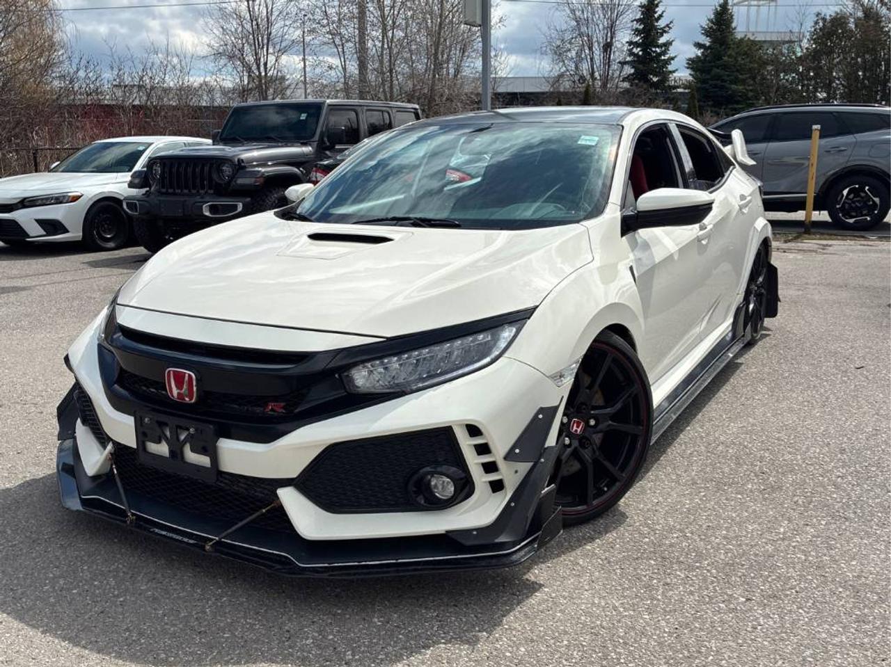 <p data-start=0 data-end=117>🔥 <strong data-start=3 data-end=80>2017 Honda Civic Type R &ndash; Modified | Championship White | Red Interior 🔥</strong><br data-start=80 data-end=83>💲 <strong data-start=86 data-end=117>$32,500 + Tax | 132,000 KMs</strong></p><p data-start=119 data-end=405>Own a true performance icon &mdash; the <strong data-start=153 data-end=180>2017 Honda Civic Type R</strong> built for drivers who want <strong data-start=208 data-end=239>speed, style, and precision</strong>. Finished in stunning white with aggressive red interior and <strong data-start=301 data-end=334>tasteful performance upgrades</strong>, this hot hatch delivers track-ready thrills and everyday drivability.</p><p data-start=407 data-end=681>⚡ <strong data-start=409 data-end=440>Why This Type R Stands Out:</strong><br data-start=440 data-end=443>✔ Turbocharged VTEC Performance<br data-start=474 data-end=477>✔ Upgraded Mods (Enhanced Sound, Power & Style)<br data-start=524 data-end=527>✔ Rare Red Interior &ndash; Race-Inspired Look<br data-start=567 data-end=570>✔ 6-Speed Manual &ndash; True Driver&rsquo;s Car<br data-start=606 data-end=609>✔ Legendary Honda Reliability<br data-start=638 data-end=641>✔ Clean, Well-Maintained & Head-Turner</p><p data-start=683 data-end=843>Perfect for enthusiasts looking for a <strong data-start=721 data-end=746>modified Civic Type R</strong>, <strong data-start=748 data-end=771>JDM performance car</strong>, or a <strong data-start=778 data-end=811>turbocharged sports hatchback</strong> that stands out from the crowd.</p><p data-start=845 data-end=996>💳 <strong data-start=848 data-end=893>FINANCING AVAILABLE &ndash; ALL CREDIT APPROVED</strong><br data-start=893 data-end=896>🛡 <strong data-start=899 data-end=937>Warranty & GAP Insurance Available (ADDITIONAL FEE)</strong><br data-start=937 data-end=940>🛠 <strong data-start=943 data-end=994>Safety Certification Available <strong data-start=899 data-end=937>(ADDITIONAL FEE)</strong></strong></p><hr data-start=998 data-end=1001><p data-start=1003 data-end=1148>📍 <strong data-start=1006 data-end=1040>Sold by Mississauga Auto Group</strong><br data-start=1040 data-end=1043>2666 Royal Windsor Dr Unit 11 & 12, Mississauga, ON<br data-start=1094 data-end=1097>📞 905-808-1198<br data-start=1112 data-end=1115>🌐 <a class=decorated-link href=http://www.mississaugaautogroup.com target=_new rel=noopener data-start=1118 data-end=1146>www.mississaugaautogroup.com</a></p><hr data-start=1150 data-end=1153><p data-start=1199 data-end=1614><strong data-start=1199 data-end=1247>2017 Honda Civic Type R for sale Mississauga</strong><br data-start=1247 data-end=1250><strong data-start=1250 data-end=1290>Modified Civic Type R Ontario Canada</strong><br data-start=1290 data-end=1293><strong data-start=1293 data-end=1323>FK8 Type R for sale Canada</strong><br data-start=1323 data-end=1326><strong data-start=1326 data-end=1366>Turbo Honda Civic Type R Mississauga</strong><br data-start=1366 data-end=1369><strong data-start=1369 data-end=1409>JDM performance car for sale Ontario</strong><br data-start=1409 data-end=1412><strong data-start=1412 data-end=1445>Manual sports car Mississauga</strong><br data-start=1445 data-end=1448><strong data-start=1448 data-end=1490>Honda Type R white red interior Canada</strong><br data-start=1490 data-end=1493><strong data-start=1493 data-end=1526>Used Civic Type R GTA Toronto</strong><br data-start=1526 data-end=1529 data-is-only-node=><strong data-start=1529 data-end=1565>Track ready Civic Type R Ontario</strong><br data-start=1565 data-end=1568><strong data-start=1568 data-end=1614>High performance hatchback for sale Canada</strong></p><p>&nbsp;</p><p>CARFAX LINK : https://vhr.carfax.ca/?id=eqwsupGs%2FXhdamIXcMJfkq20+zDkh4L9</p>