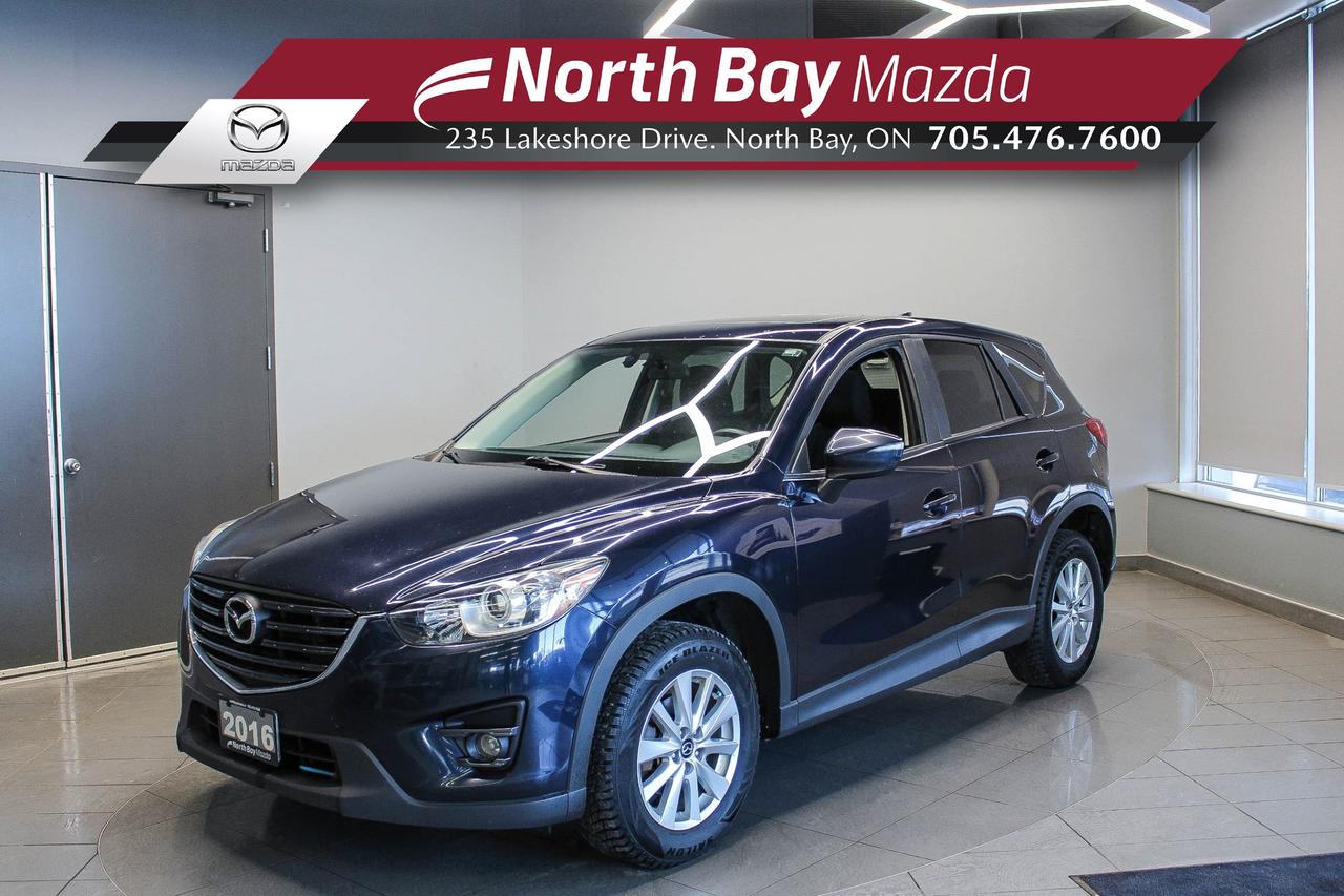 The 2016 Mazda CX-5 GS is a compact SUV that strikes the perfect balance between practicality and driving enjoyment. Whether youre commuting through the week, heading out on a road trip, or loading up for errands, the CX-5 GS is built to handle it all comfortably. FEATURES: All-Wheel Drive,Cloth upholstery, Heated Front Seats, Power Driver Seat, Rearview Camera, Push Button Start, Mazda Connect Infotainment System, 7-Inch Display, Bluetooth Hands-Free Calling and Audio, Cruise Control, USB Ports, AM/FM Radio, Split Folding Rear Seats. 

Why Youll Want to Buy from North Bay Mazda? *The Clubhouse Commitment Pre-Owned Vehicle Program provides you with additional coverage for things such as the 3-year Tire and Rim Coverage, The Clubhouse Powertrain Warranty, coverage for The Little Things like battery, wiper, and bulb replacement, 3- year anti-theft protection to give you the ultimate peace of mind when purchasing a pre-owned vehicle. Clubhouse Commitment is an optional coverage which 
can be purchased at time of sale for a $699 value. Pre-Owned Vehicle purchases are subject to 
an adjusted price when purchasing with cash. You are eligible for Finance Pricing with a maximum down payment of 15% of listed finance price. Contact us for more details. * Our certified vehicles go through a 120-point Clubhouse Certified Used Vehicle Inspection, and we will provide the CarFax vehicle history documents as well as any available service history. * We competitively price our vehicles below the market average which means that we have already done all the market research for you. Rest assured that you are getting the best deal possible. * We have automotive financial experts who are experienced in dealing with all levels of credit challenges. We also work with all major banks and third-party lenders daily so we are confident that we can get you the best rate available. * As a premier New and Pre-Owned vehicle 
dealership, we pride ourselves on a superior customer experience and a lifetime of customer care. We are conveniently located at 235 Lakeshore Drive, in North Bay, Ontario. If you cant make it to us, we can accommodate you! Call us today at 705-476-7600 to come in and see this vehicle!