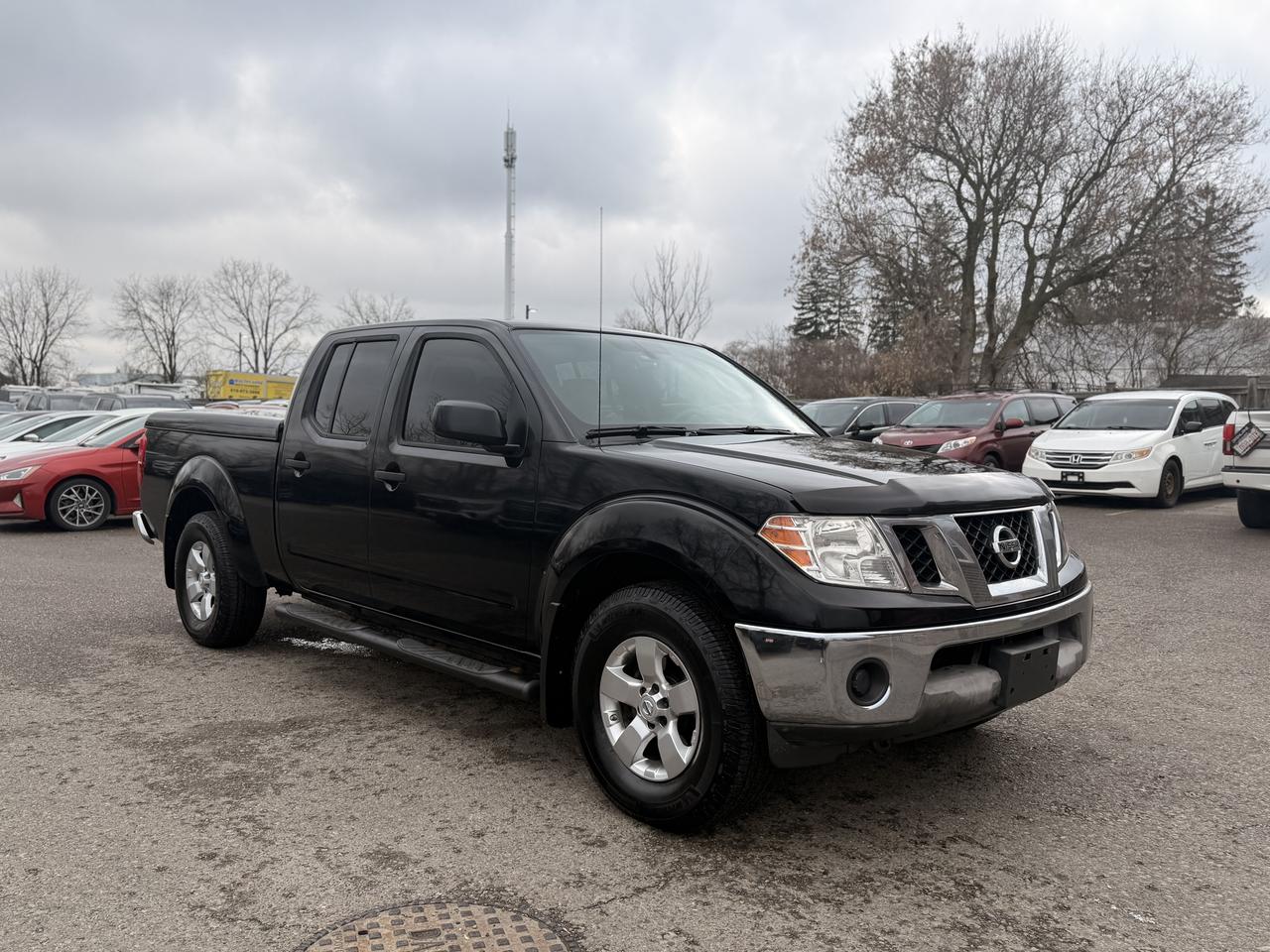 2010 Nissan Frontier SE | Well Maintained | Rare Manual - Photo #1