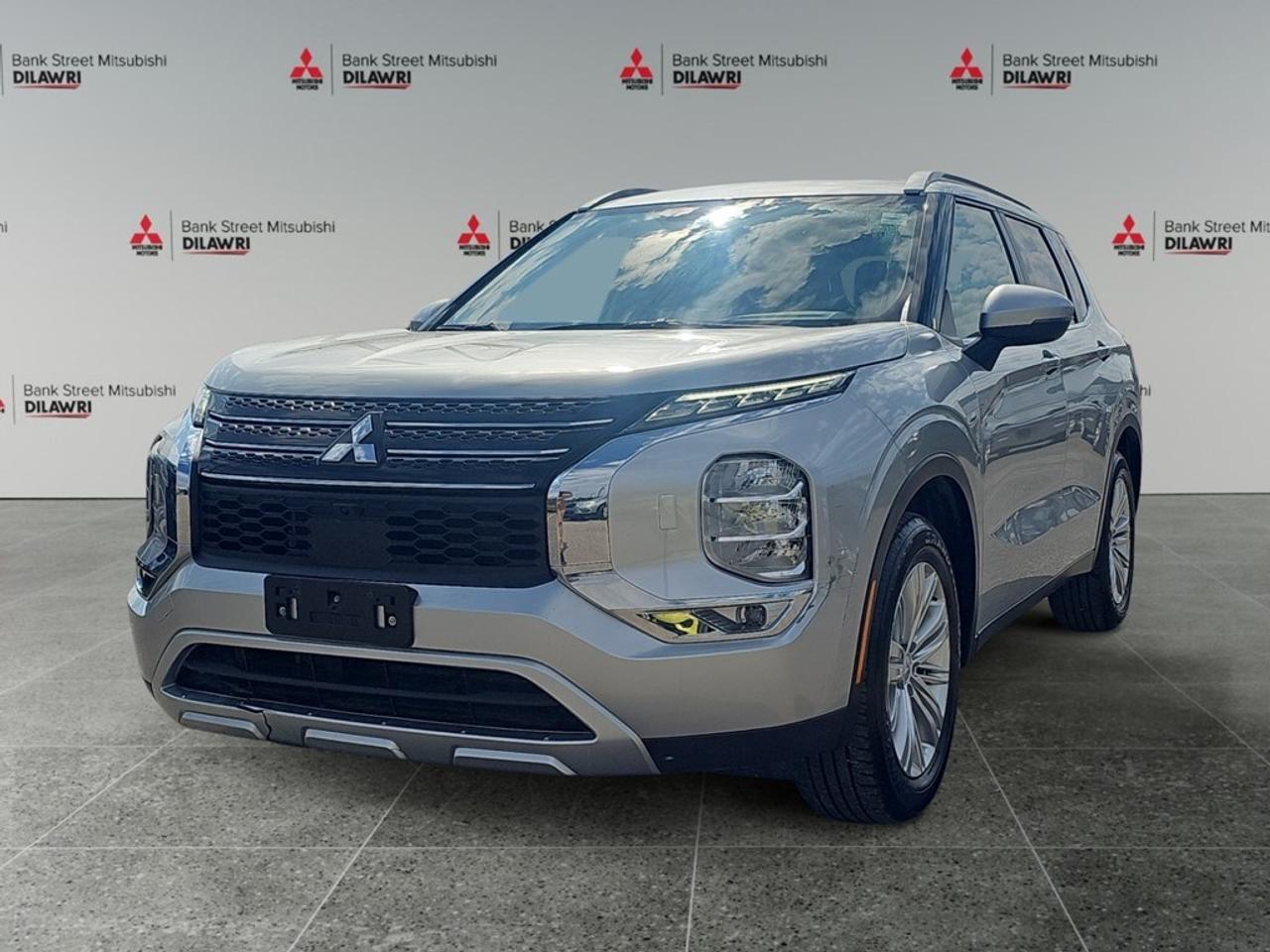 Balance of 5 year/100,000kms BASIC warranty and 10 year/160,000kms Factory Powertrain Warranty on ALL MITSUBISHI products! Best in the industry!!!! The 2023 Mitsubishi Outlander SE S-AWC in stunning Silver comes equipped with a capable 4x4 drivetrain that promises excellent handling in various driving conditions. This SUVs sleek design is complemented by its alloy wheels and a stylish sunroof that gives it a premium look. Inside, comfort is paramount with features like heated seats and smart device integration that keep everyone entertained and connected. It boasts of a spacious interior with power windows, keyless entry, and a Bluetooth connection for seamless connectivity, making every drive enjoyable and convenient. This Outlander is equipped with a range of advanced technologies, including a backup camera and parking sensors that make maneuvering a breeze. Safety is enhanced through lane assist and brake assist, ensuring peace of mind on every journey. The inclusion of satellite radio adds to the technology suite, offering endless entertainment options. Ideal for families or individuals looking for a reliable and stylish SUV, the 2023 Mitsubishi Outlander SE S-AWC is waiting for you. Contact the dealership today to learn more and arrange a test drive to experience all it has to offer.