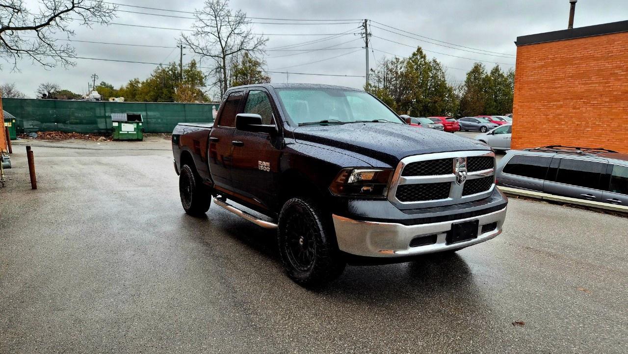 2014 RAM 1500 4WD Quad Cab 6.4 Ft Box ST Photo2