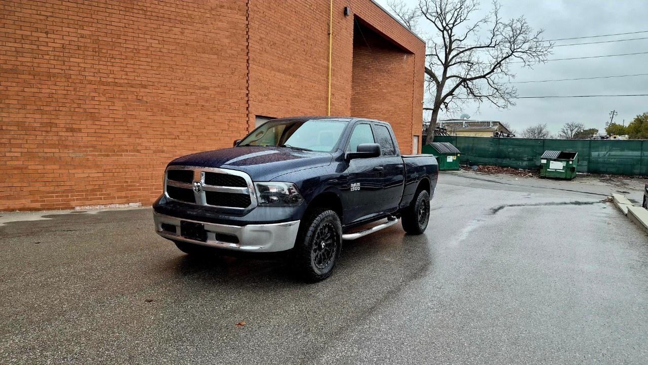2014 RAM 1500 4WD Quad Cab 6.4 Ft Box ST Photo0