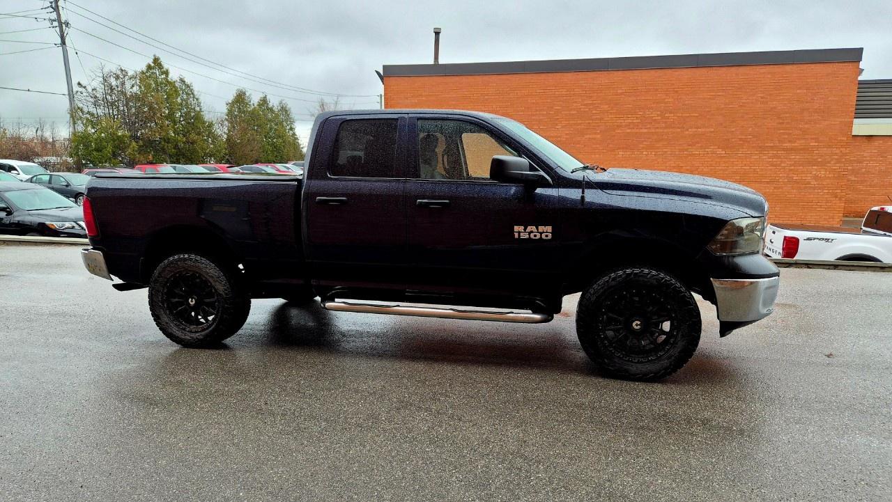 2014 RAM 1500 4WD Quad Cab 6.4 Ft Box ST Photo3