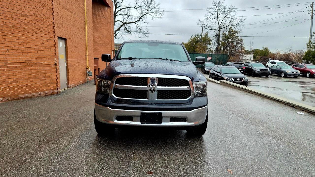 2014 RAM 1500 4WD Quad Cab 6.4 Ft Box ST Photo