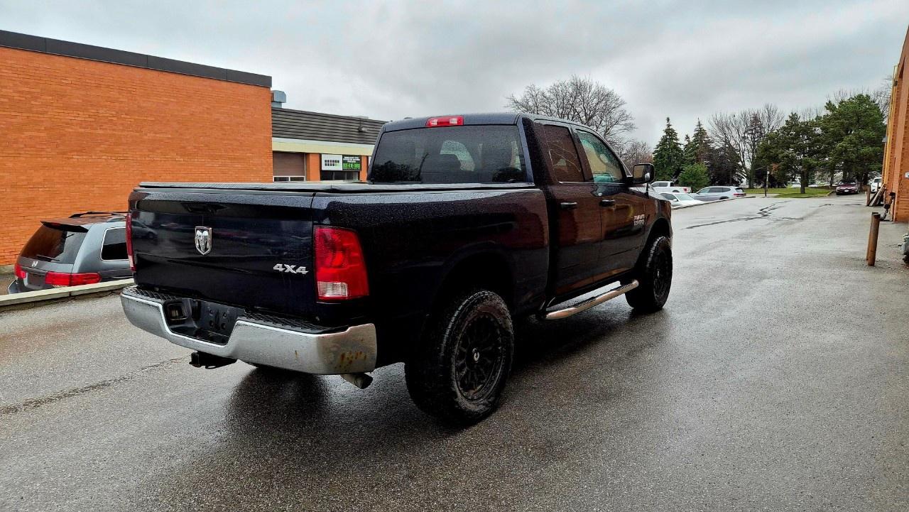 2014 RAM 1500 4WD Quad Cab 6.4 Ft Box ST Photo