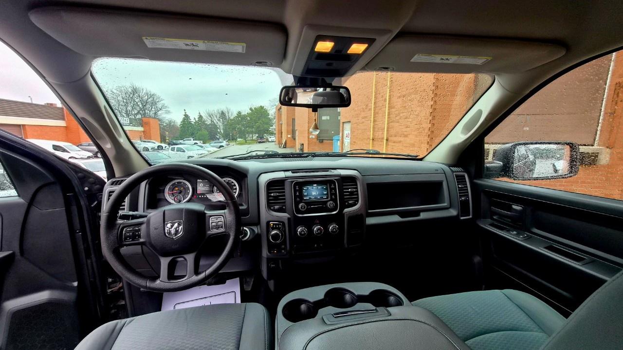 2014 RAM 1500 4WD Quad Cab 6.4 Ft Box ST Photo