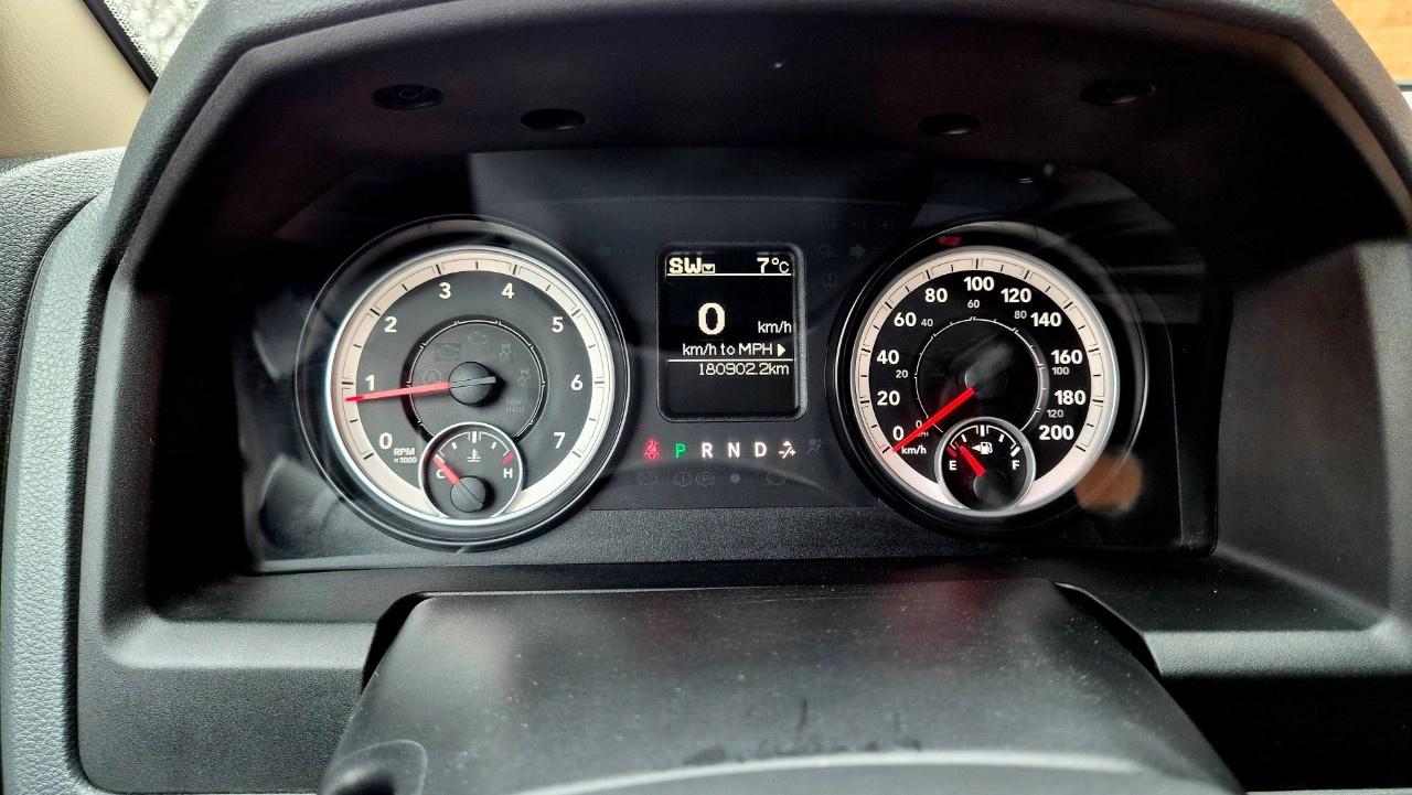 2014 RAM 1500 4WD Quad Cab 6.4 Ft Box ST Photo