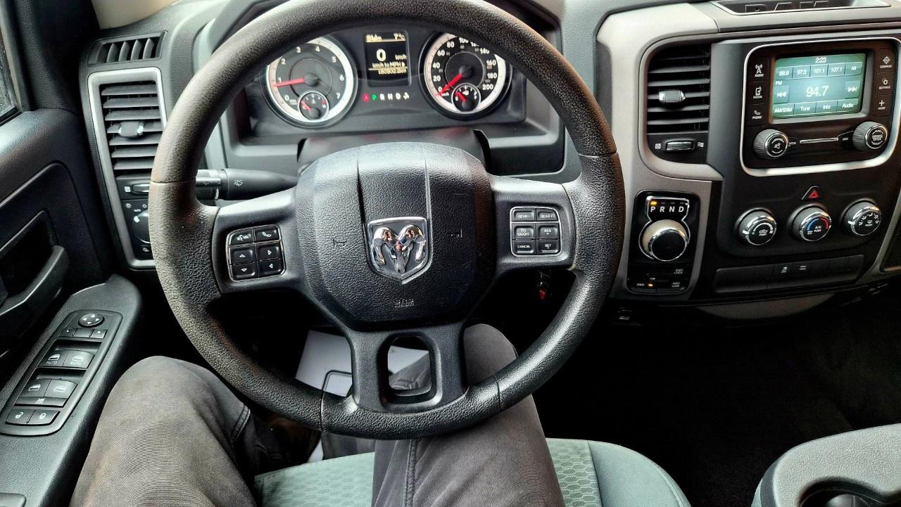 2014 RAM 1500 4WD Quad Cab 6.4 Ft Box ST Photo