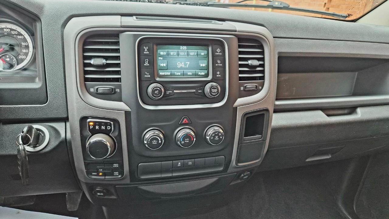 2014 RAM 1500 4WD Quad Cab 6.4 Ft Box ST Photo