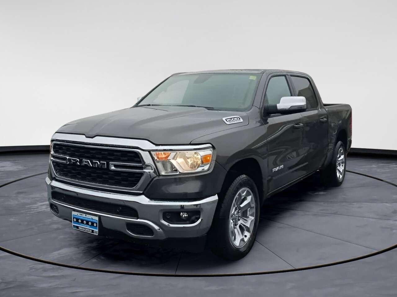 Experience the power and versatility of the 2024 Ram 1500 Big Horn, now available in an attractive gray finish with a robust 4x4 drivetrain for unmatched handling on any terrain. This impressive truck comes equipped with a refined automatic transmission, offering both strength and luxury.With its gray exterior, the 1500 Big Horn exudes style and elegance while providing practical features like heated mirrors for those cold Canadian mornings. Inside, youll find comfort and sophistication with a leather steering wheel and a spacious Crew Cab design. Standard options include power windows, keyless entry, and air conditioning, ensuring a comfortable and convenient drive every time.This model is packed with technology, featuring a modern backup camera and Bluetooth connectivity to keep you connected on the go. Safety and driver assistance are a priority, with features like brake assist and cruise control. Under the hood, the powerful 5.7L HEMI VVT V8 engine with ETORQUE and heavy-duty cooling delivers performance and durability, complemented by a dual rear exhaust system that adds a touch of sportif flair.Whether youre an adventure seeker or need a reliable partner for your tough jobs, the 2024 Ram 1500 Big Horn is built to meet all your needs. Contact Windsor Chrysler today to learn more about this exceptional truck and schedule a test drive.