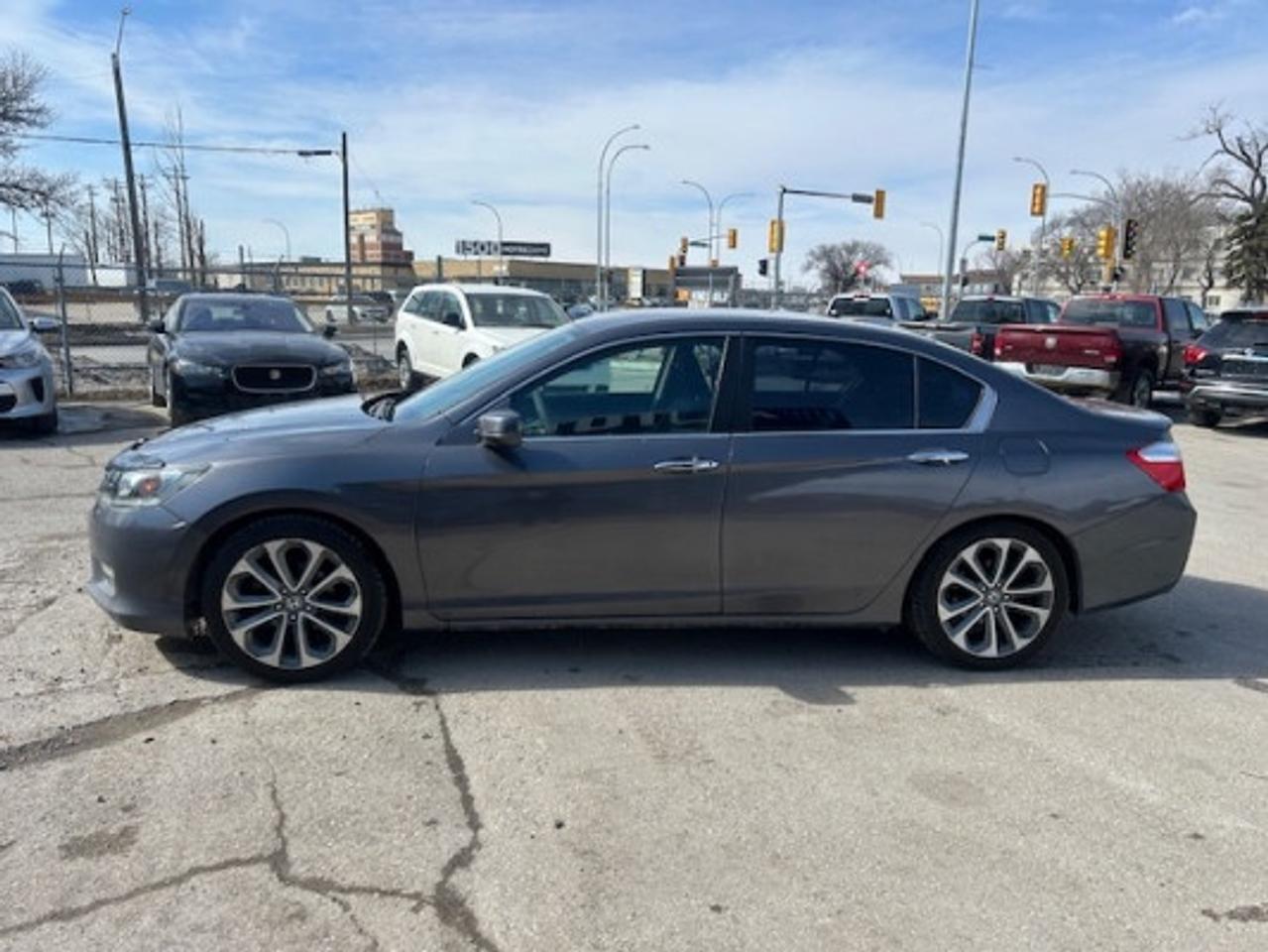 <p>Auto Save (Dealer # 1747)</p>
<p>2014 HONDA ACCORD SPORT, FWD</p>
<p>2.4L&nbsp; ENGINE 221563KM</p>
<p>&nbsp;</p>
<p>**Clean Title**</p>
<p>**Manitoba Safety**</p>
<p>&nbsp;</p>
<p>FEATURES:</p>
<p>5 PASSENGER</p>
<p>AIR CONDITIONING&nbsp;</p>
<p>AM/FM/CD</p>
<p>BLUETOOTH</p>
<p>CRUISE CONTROL</p>
<p>BACK UP CAMERA</p>
<p>POWER LOCKS</p>
<p>POWER STEERING</p>
<p>POWER WINDOWS</p>
<p>TRACTION CONTROL</p>
<p>&nbsp;</p>
<p>Asking $11 998+ taxes</p>
<p>** Financing Available O.A.C**</p>
<p>** Warranty Available **</p>
<p>&nbsp;</p>
<p>Call (204)-774-8900 or (204)-999-9500</p>
<p>Located 6 mins away from Polo Park Mall</p>
<p>1450 Notre Dame Ave, Winnipeg, Manitoba</p>
<p>www.autosavewpg.com</p>
<p>&nbsp;</p>
<p>While all information is believed to be accurate on this page, please verify any information in question with an Auto Save sales representative. Auto Save is not liable for any errors or omissions.</p>