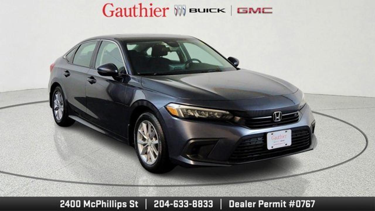 The 2023 Honda Civic Sedan EX is a well-rounded compact car that pairs efficiency with performance, featuring a 1.5-liter turbocharged four-cylinder engine producing about 180 horsepower and matched to a smooth CVT for responsive everyday driving. It offers a comfortable and upgraded interior with features like a power moonroof, heated front seats, dual-zone automatic climate control, and a user-friendly touchscreen with Apple CarPlay and Android Auto integration. Safety is a key highlight, with the Honda Sensing suite including adaptive cruise control, lane-keeping assist, and collision mitigation braking to enhance driver confidence.