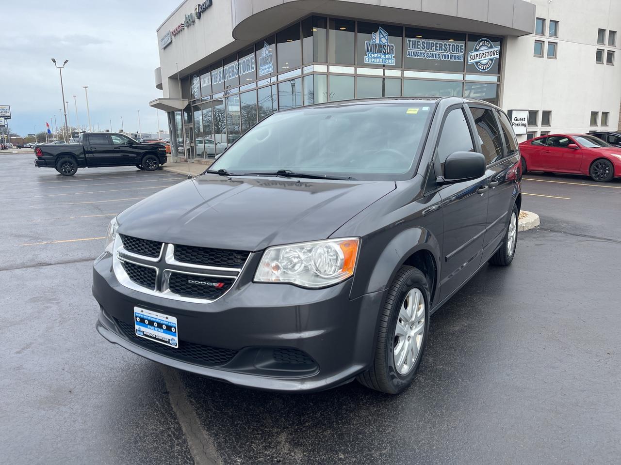 Recent Arrival!Granite Crystal Metallic Clearcoat 2016 Dodge Grand Caravan SE FWD 6-Speed Automatic Pentastar 3.6L V6 VVT**CARPROOF CERTIFIED**.* PLEASE SEE OUR MAIN WEBSITE FOR MORE PICTURES AND CARFAX REPORTS * This vehicle is being sold "as is," unfit, and is not represented as being in road worthy condition, mechanically sound or maintained at any guaranteed level of quality. The vehicle may not be fit for use as a means of transportation and may require substantial repairs at the purchasers expense.PLEASE SEE OUR MAIN WEBSITE FOR MORE PICTURES AND CARFAX REPORTS * We buy all makes and models let us buy your vehicle. Proudly Serving Windsor, Essex, Leamington, Kingsville, Belle River, LaSalle, Amherstburg, Tecumseh, Lakeshore, Strathroy, Stratford, Leamington, Tilbury, Essex, St. Thomas, Waterloo, Wallaceburg, St. Clair Beach, Puce, Riverside, London, Chatham, Kitchener, Guelph, Goderich, Brantford, St. Catherines, Milton, Mississauga, Toronto, Hamilton, Oakville, Barrie, Scarborough