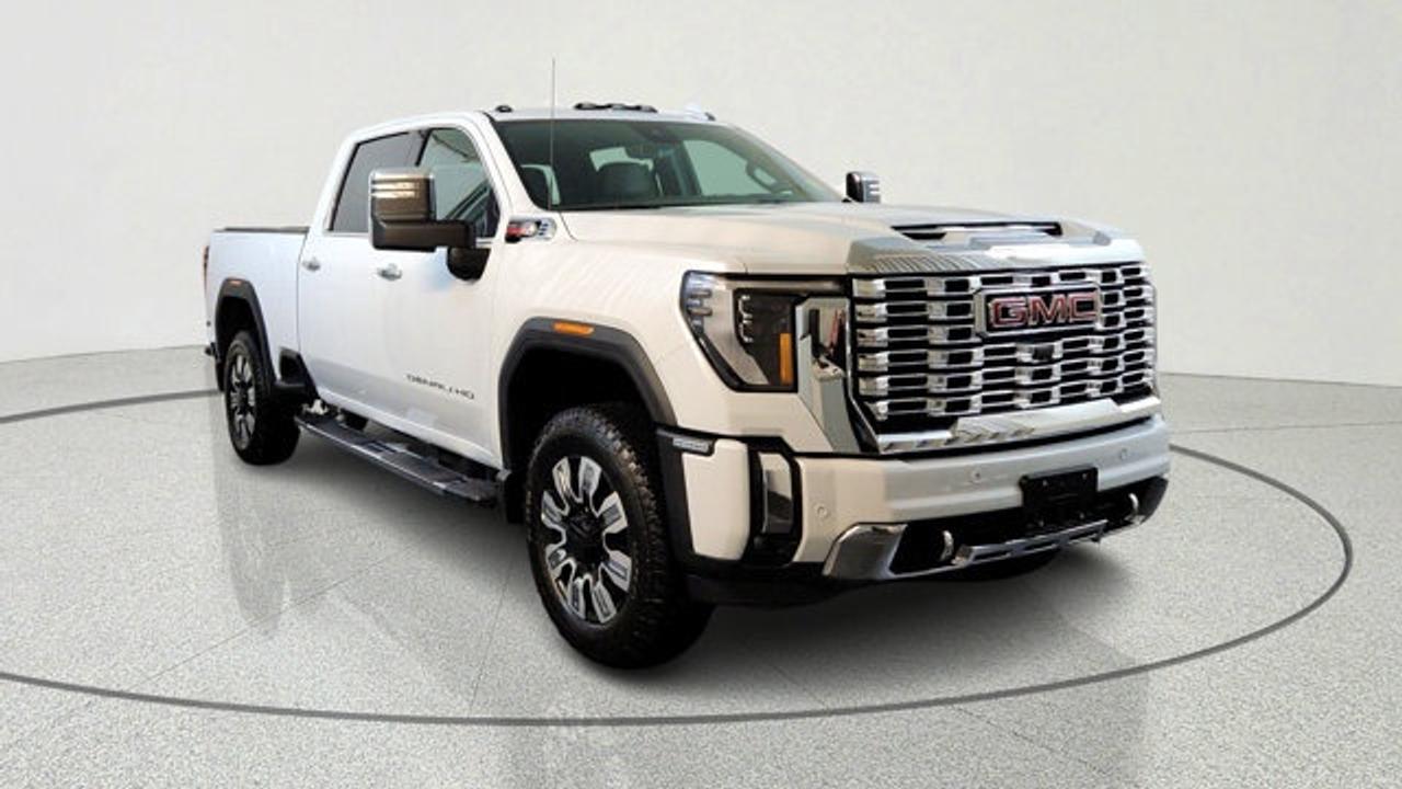 This Sierra 2500HD stands out with its Duramax diesel engine, paired with a smooth 10-speed automatic transmission for effortless hauling and highway cruising. The lowered GVWR option keeps it agile while maintaining impressive capability, and the gooseneck/5th wheel prep package makes it ideal for serious trailers. Four-wheel drive and off-road suspension handle Manitobas varied terrain with ease.<br />Inside, enjoy premium comfort from heated and ventilated front bucket seats, a heated steering wheel, and dual-zone automatic climate control. The 13.4-inch infotainment screen supports wireless Apple CarPlay, Android Auto, and navigation, while the Bose premium sound system fills the cab with quality audio. Tech like the rear camera mirror and head-up display keeps your focus on the road.<br />Safety features include blind-spot monitoring, lane departure warning, adaptive cruise control, and HD surround vision for confident driving. The spray-on bedliner, power sunroof, and hard folding truck bed cover add practicality for daily use.
