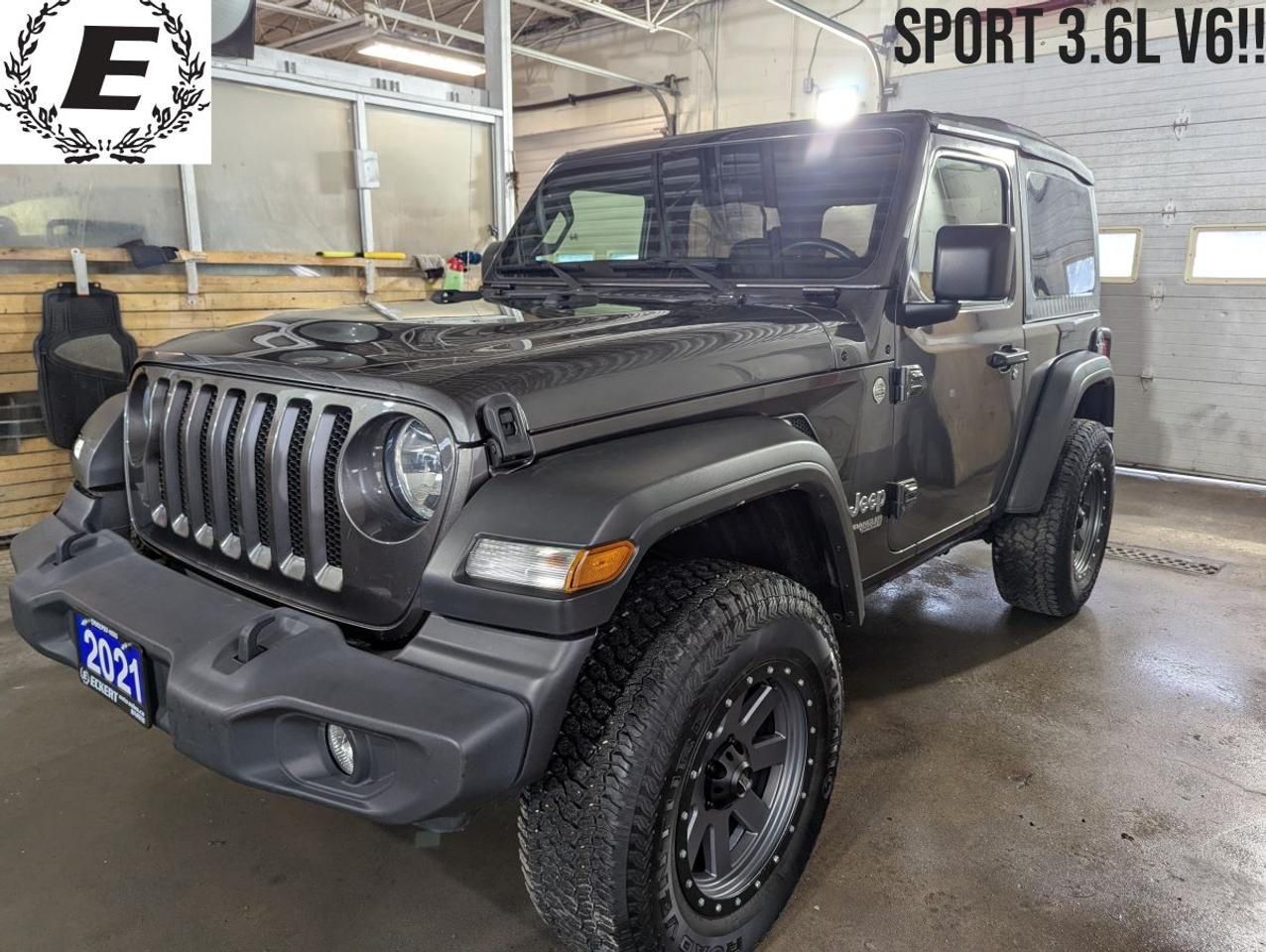 <p>Conquer any terrain with this rugged 2021 Jeep Wrangler Sport, now available at Eckert Auto Sales, 192 Essa Road, Barrie! This iconic SUV boasts a powerful 3.6L V6 engine, ready to take you on thrilling adventures. Finished in a sleek gray exterior with a comfortable black interior, this Wrangler is the perfect blend of style and capability. With only 102,300km on the odometer, this well-maintained Jeep is ready for its next chapter, and so are you!</p><p>This particular Wrangler Sport comes with a soft top, offering that open-air experience you crave on those beautiful Canadian summer days. Its 4-wheel drive system ensures you can confidently navigate challenging conditions, whether youre exploring off-road trails or facing a snowy winter commute. This Jeep is built to handle anything you throw at it. Visit Eckert Auto Sales today and experience the freedom and excitement of driving a Wrangler!</p><p>The price includes our Advantage Package!! For more information give us a call today at (705)797-1100.</p>