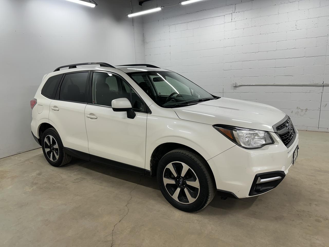 <p>Looking for a reliable and capable SUV thats ready for any adventure? Check out this stunning 2017 Subaru Forester 2.5i Touring, available now at Troys Toys! This rugged beauty boasts a crisp white exterior and a sleek black interior, offering a comfortable and stylish ride. With the legendary Subaru symmetrical all-wheel-drive system and a responsive 2.5L I4 engine, this Forester is built to handle Canadas diverse driving conditions, from city streets to weekend getaways. Having clocked 166,116 km, this Forester is ready for many more adventures.</p><p>This Forester is equipped with a manual transmission, giving you complete control and a more engaging driving experience. Its spacious interior and versatile cargo area make it perfect for families, outdoor enthusiasts, or anyone needing plenty of room for passengers and gear. Dont miss the opportunity to own a well-maintained Subaru Forester, known for its longevity and performance!</p><p>Here are a few standout features:</p><ul><li><strong>Legendary All-Wheel Drive:</strong> Conquer any road condition with confidence.</li><li><strong>Manual Transmission:</strong> Experience driving with greater control.</li><li><strong>Spacious Interior:</strong> Comfortably accommodate passengers and cargo.</li><li><strong>Rugged Versatility:</strong> Ready for any adventure!</li><li><strong>Fuel-Efficient Engine:</strong> Enjoy excellent fuel economy.</li></ul><p><strong><em>Powered by AutoIntelligence&trade;</em></strong> Vehicle information has been generated using artificial intelligence and is provided for informational purposes only. While efforts are made to ensure accuracy, please confirm all details directly with the dealer.</p>