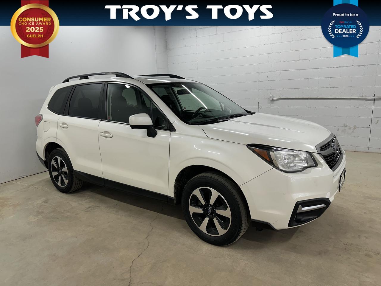 <p>Looking for a reliable and capable SUV thats ready for any adventure? Check out this stunning 2017 Subaru Forester 2.5i Touring, available now at Troys Toys! This rugged beauty boasts a crisp white exterior and a sleek black interior, offering a comfortable and stylish ride. With the legendary Subaru symmetrical all-wheel-drive system and a responsive 2.5L I4 engine, this Forester is built to handle Canadas diverse driving conditions, from city streets to weekend getaways. Having clocked 166,116 km, this Forester is ready for many more adventures.</p><p>This Forester is equipped with a manual transmission, giving you complete control and a more engaging driving experience. Its spacious interior and versatile cargo area make it perfect for families, outdoor enthusiasts, or anyone needing plenty of room for passengers and gear. Dont miss the opportunity to own a well-maintained Subaru Forester, known for its longevity and performance!</p><p>Here are a few standout features:</p><ul><li><strong>Legendary All-Wheel Drive:</strong> Conquer any road condition with confidence.</li><li><strong>Manual Transmission:</strong> Experience driving with greater control.</li><li><strong>Spacious Interior:</strong> Comfortably accommodate passengers and cargo.</li><li><strong>Rugged Versatility:</strong> Ready for any adventure!</li><li><strong>Fuel-Efficient Engine:</strong> Enjoy excellent fuel economy.</li></ul><p><strong><em>Powered by AutoIntelligence&trade;</em></strong> Vehicle information has been generated using artificial intelligence and is provided for informational purposes only. While efforts are made to ensure accuracy, please confirm all details directly with the dealer.</p>