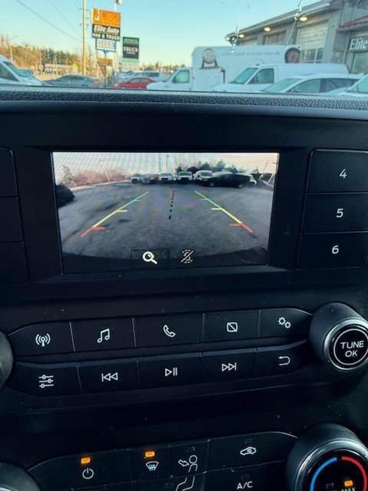 2020 Ford Transit Extended T-150 with Divider, Certified. Photo