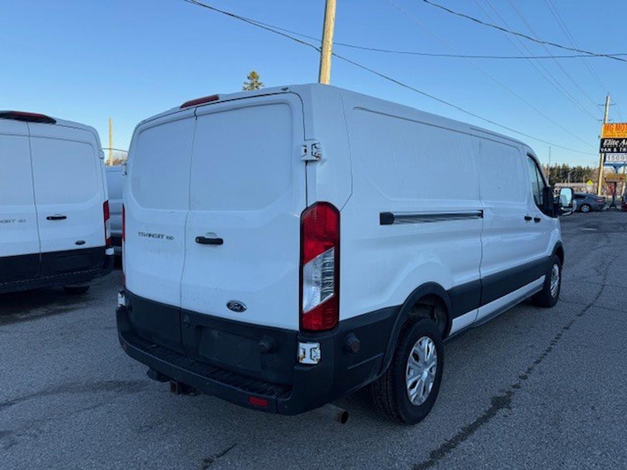 2020 Ford Transit Cargo Van Extended T-150 with Divider, Certified. Photo