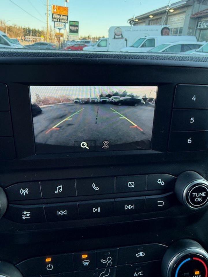 2020 Ford Transit Cargo Van Extended T-150 with Divider, Certified. Photo