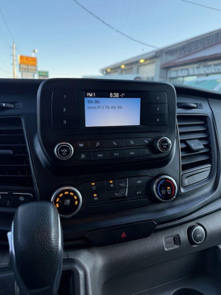 2020 Ford Transit Cargo Van Extended T-150 with Divider, Certified. Photo