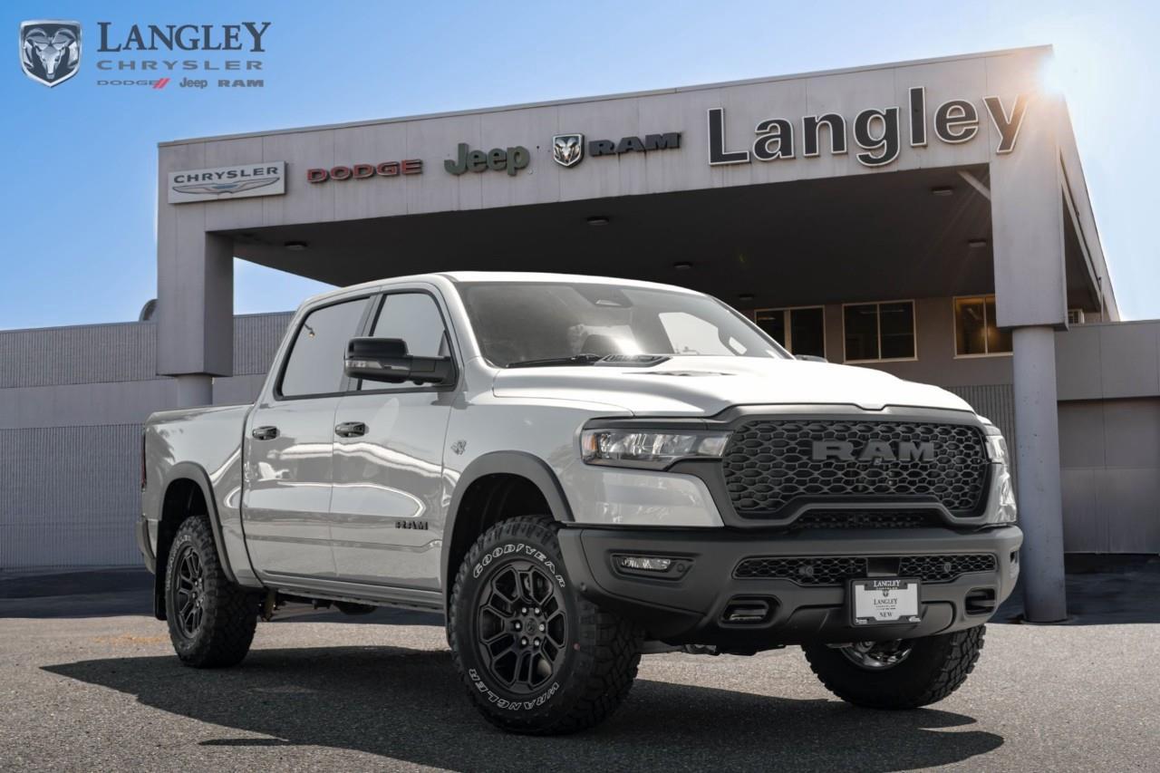 <p><strong>2026 Ram 1500 Rebel 4x4 Crew Cab 5'7" Box</strong></p><p>The 2026 Ram 1500 Rebel is a rugged, off-road-focused pickup that combines the legendary sound and performance of the returning 5.7L HEMI V8 engine with advanced trail-ready capability.</p><ul><li><p>Engine: 5.7L HEMI V8 with eTorque (395 hp, 410 lb-ft torque)</p></li><li><p>Drivetrain: 4x4 with electronic locking rear axle</p></li><li><p>Max Towing Capacity: 11,330 lbs</p></li><li><p>Infotainment: Uconnect 5 with 12-inch touchscreen display</p></li><li><p>Suspension: Off-road performance-tuned suspension with 1-inch factory lift</p></li></ul><p>Come book a test drive at Langley Chrysler, conveniently located in Langley, British Columbia.</p>*All new vehicle purchases are plus the PDI accessory installs and any price increases provided by the manufacturer. For trucks the accessories will include wheel locks, spray-in liners, and mud flaps. For all other vehicles, wheel locks are standard, other equipment may apply. Confirm with the dealer.

<p>*All prices are net of all manufacturer incentives and/or rebates and are subject to change by the manufacturer without notice. All prices plus applicable taxes, applicable environmental recovery charges, documentation of $599 and full tank of fuel surcharge of $76 if a full tank is chosen.<br />Other items available that are not included in the above price:<br />Tire & Rim Protection and Key fob insurance starting from $599<br />Service contracts (extended warranties) for up to 7 years and 200,000 kms starting from $599<br />Custom vehicle accessory packages, mudflaps and deflectors, tire and rim packages, lift kits, exhaust kits and tonneau covers, canopies and much more that can be added to your payment at time of purchase<br />Undercoating, rust modules, and full protection packages starting from $199<br />Flexible life, disability and critical illness insurances to protect portions of or the entire length of vehicle loan?im?im<br />Financing Fee of $500 when applicable<br />Prices shown are determined using the largest available rebates and incentives and may not qualify for special APR finance offers. See dealer for details. This is a limited time offer.</p>