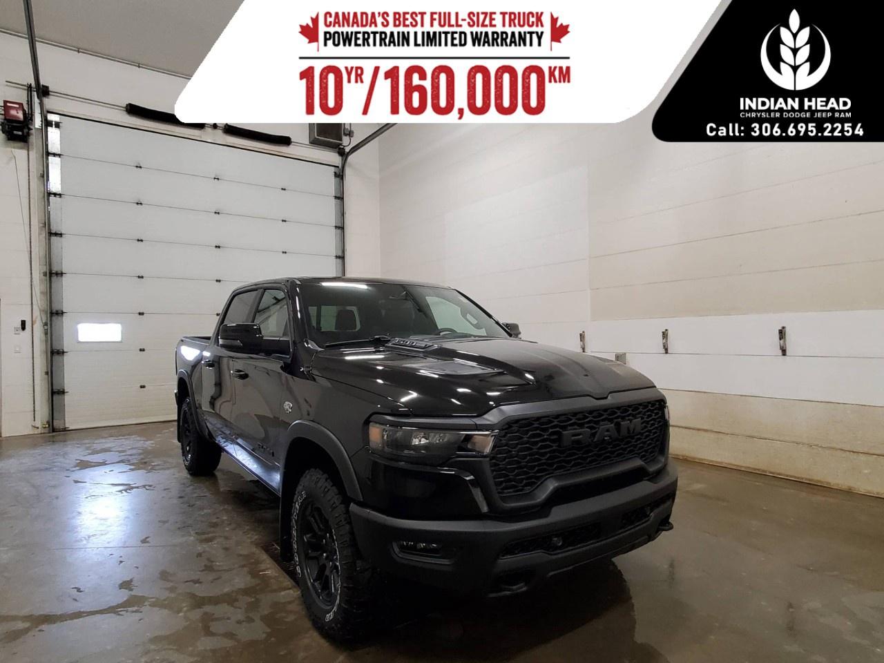 <p>The <strong>2026 Ram 1500 Rebel Crew Cab 4x4</strong> is built for drivers who want bold off-road capability, premium comfort, and modern technology wrapped in one aggressive package. Finished in striking <strong>Diamond Black Crystal Pearl</strong>, this Rebel stands out with rugged styling, confident performance, and a feature-rich interior designed for both adventure and everyday driving.</p><p>Power comes from the legendary <strong>5.7L HEMI® VVT V8 engine with FuelSaver MDS and eTorque</strong>, paired with a smooth <strong>8-speed automatic transmission</strong>. This proven powertrain delivers strong towing capability, responsive acceleration, and the confidence needed for everything from highway travel to off-the-beaten-path exploration. Off-road readiness is enhanced with <strong>front performance-tuned shock absorbers</strong>, <strong>rear performance-tuned shock absorbers</strong>, a <strong>fuel tank skid plate</strong>, and a <strong>transfer case skid plate</strong>.</p><p>Inside, the cabin combines rugged utility with premium comfort. Luxury leather-faced front bucket seats, heated and ventilated front seats, second-row heated seats, and a heated steering wheel provide comfort in every season. The impressive <strong>Rebel Level 2 Equipment Group</strong> adds sought-after features including <strong>dual wireless charging pads</strong>, <strong>Smartphone as a Key</strong>, <strong>power tailgate</strong>, memory settings for the drivers seat, pedals and mirrors, power-adjustable passenger seating with lumbar support, and a premium <strong>19-speaker harman/kardon® audio system</strong>.</p><p>Technology is front and centre with the massive <strong>14.4-inch touchscreen display</strong> featuring <strong>Uconnect® 5 NAV</strong>, along with a <strong>14.4-inch passenger interactive display</strong> that enhances the in-cabin experience. Additional highlights include a <strong>dual-pane panoramic sunroof</strong>, rear wheelhouse liners, integrated trailer brake control, and a <strong>115-volt rear auxiliary power outlet</strong> for added convenience.</p><p>The exterior receives further enhancements with the bold <strong>steel sport hood</strong>, HEMI badging, and aggressive Rebel styling cues that give this truck a commanding presence wherever it goes. Combined with its advanced safety systems, premium interior appointments, and legendary Ram capability, this Rebel is ready for work, play, and everything in between.</p><p>Please confirm all vehicle details and features with our sales team and start the buying process today.</p>