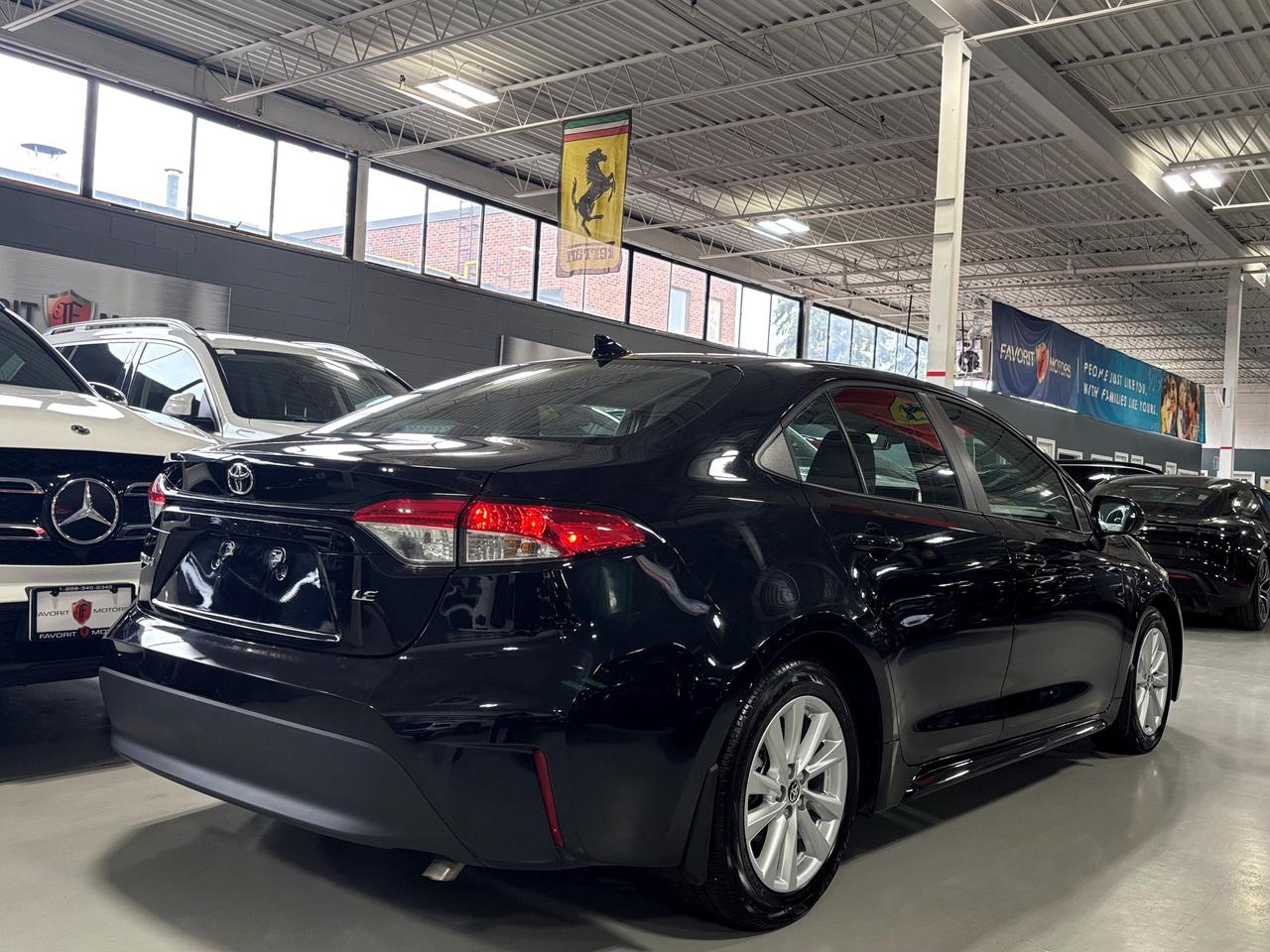 2025 Toyota Corolla LE CVT|ALLOYS|SUNROOF|WIRELESSCHARGING|HEATSTEER|+ Photo