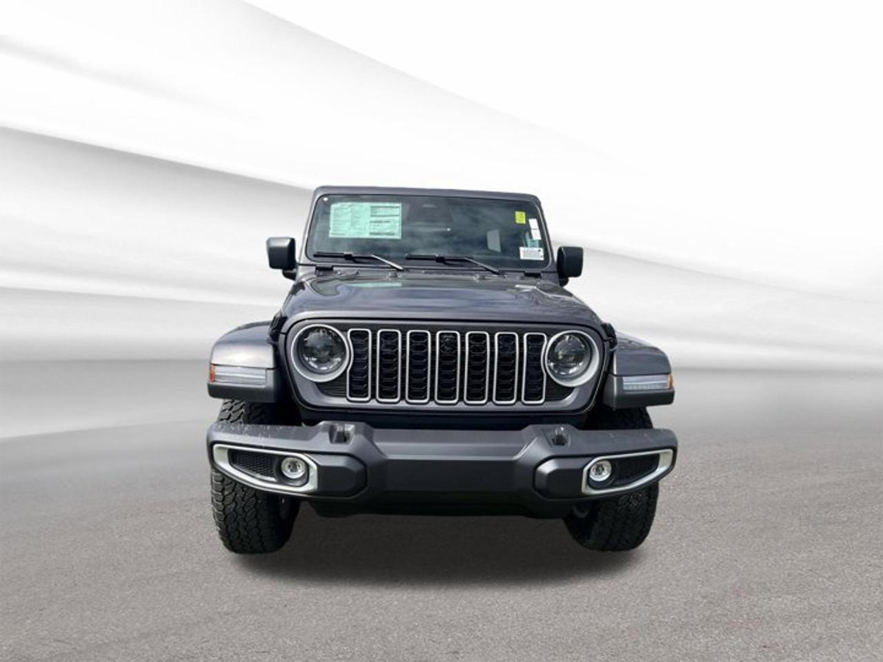 Meet the brand new 2026 Jeep Wrangler Sahara at Steele Halifax Chrysler Dodge Jeep Ram FIAT in Halifax. This four-door convertible blends classic Jeep freedom with everyday ease. Finished in Grey with a Black interior, this Wrangler Sahara brings open-air fun, proven 4x4 capability, and the confidence of a 3.6-litre V-6 engine.Built for drivers who want real versatility, the 2026 Jeep Wrangler Sahara is ready for city streets, coastal drives, and weekend escapes. Its automatic transmission helps make each trip smooth and simple, while the four-wheel-drive system adds traction when conditions change. Side steps also make entry and exit easier every day.FEATURES OF THE Wrangler SaharaIconic removable-roof Jeep convertible designFour-door layout adds daily practicalityFour-wheel drive for confident tractionAutomatic transmission supports easy drivingADVANCED SAFETY FEATURESAuto-dimming rearview mirror reduces night glareFour-door design supports easy passenger accessFour-wheel drive adds control on roadsStrong Jeep build inspires daily confidencePERFORMANCE AND EFFICIENCY3.6-litre Pentastar V-6 delivers proven powerAutomatic transmission provides smooth shifting responseFour-wheel drive helps manage changing surfacesRegular unleaded fuel keeps refuelling simpleCOMFORT AND CONVENIENCESide steps help easier cabin entryFour-door body improves passenger convenienceConvertible design brings open-air enjoymentBlack interior offers a clean lookTECHNONOLGY AND CONNECTIVITYClear driver-focused layout supports easy useAutomatic operation helps reduce driving effortAuto-dimming mirror improves nighttime comfortEssential controls stay close at handCARGO SPACEFour-door design supports everyday versatilityRear area handles daily gear wellCabin layout balances passengers and cargoPractical space for errands or tripsWHAT OTHER OWNERS LIKEOpen-air driving creates memorable daily tripsV-6 power feels strong and familiarFour-wheel drive boosts all-season confidenceFour-door layout adds family-friendly usefulnessThe 2026 Jeep Wrangler Sahara stays true to Jeep heritage while giving you the comfort and usability needed for modern driving. It is a smart choice for drivers who want one vehicle that can handle commuting, recreation, and changing road conditions without losing its sense of fun.With its Grey exterior, Black interior, automatic transmission, 4x4 capability, side steps, and auto-dimming rearview mirror, this brand new 2026 Jeep Wrangler Sahara offers a focused set of features that matter. Visit Steele Halifax Chrysler Dodge Jeep Ram FIAT in Halifax and discover a new Jeep built for freedom, confidence, and year-round adventure.This 2026 Jeep Wrangler Saharas VIN is: 1C4PJXEG5TW256002.We invite you to book a viewing and test drive at your earliest convenience