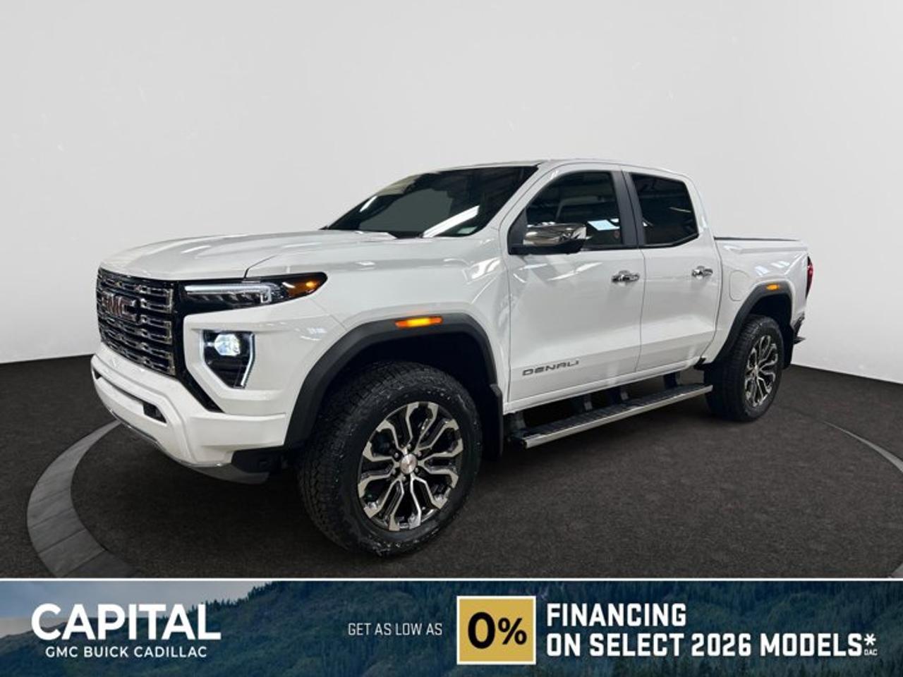 This 2026 GMC Canyon in Summit White is equipped with 4WD and Turbocharged Gas I4 2.7L/ engine.The GMC Canyon might be midsize, but its fully premium. Designed for easy access, an available easy lift and lower tailgate allows for smooth operation, while an integrated corner-step rear bumper provides efficient access to the truck bed and your cargo. Its the little things that set the Canyon apart, like its LED-signature front lighting, chrome grille surrounds and chrome mirror caps and door handles. The Canyon is takes premium comfort to a new level with features such as available soft-touch instrument panel and available heated driver and front passenger seats. The interior is also engineered to give you and your passengers an exceptional level of quiet, from noise-reducing innovations to triple door seals. This truck offers an engine lineup that delivers power and efficiency. This baby has 308 horsepower and can tow up to 3493 KG (7700 LB.). Intelligent control features, including traction control, trailer sway and hill descent control, available automatic rear locking differential, brake rotors and integrated trailer brake controller and diesel exhaust brake, to help you stay confidently in command no matter what you may be hauling or trailering. The Canyon provides intelligently placed controls and driver-centric features to keep you in touch, in charge and connected on the road, from available built-in Wi-Fi, an infotainment system with navigation and a rear-vision camera, to power outlets, rear seat reminders and access to the myGMC app. Youll also find state-of-the-art safety to help enhance your awareness of the road and surrounding vehicles, such as available forward collision alert, and more.Key features of the Canyon Denali include: Forward Collision Alert, Perforated leather-appointed heated & ventilated front seats, 5 chrome assist steps, Spray-on bedliner with GMC logo, 20 Ultra-Bright machined aluminum wheels, Bose 7-Speaker Premium audio system, and 308 hp 3.6L V6 engine with Active Fuel Management.Check out this vehicles pictures, features, options and specs, and let us know if you have any questions. Helping find the perfect vehicle FOR YOU is our only priority.P.S...Sometimes texting is easier. Text (or call) 306-801-9090 for fast answers at your fingertips!Dealer License #914248Disclaimer: All prices are plus taxes & fees. See dealer for Details. Dealer Permit # 914248 See dealer for Details.