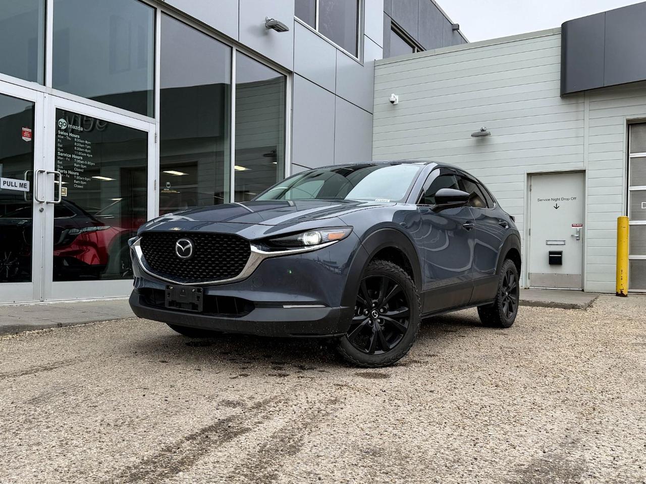 Discover the thrill of driving with this pre-owned 2021 Mazda CX-30 GT Turbo AWD in stunning Polymetal Grey Metallic. Powered by a 2.5L SKYACTIV-G turbo engine paired with smooth 6-speed automatic transmission, this compact SUV delivers sporty performance and all-weather confidence with full-time all-wheel drive. Inside, enjoy premium comfort with heated leather-trimmed seats, dual-zone climate control, and advanced tech like navigation, a vibrant 8.8-inch display, and a premium 12-speaker sound system. Safety is top-notch with blind-spot monitoring, lane departure warning, and a rearview camera. Perfectly blending style, power, and innovationthis CX-30 GT Turbo AWD is ready to elevate your drives. Visit Go Mazda today and take it for a test drive!Go Mazda is an AMVIC licensed businessThis vehicle has been registered in the province ofBritish Columbia